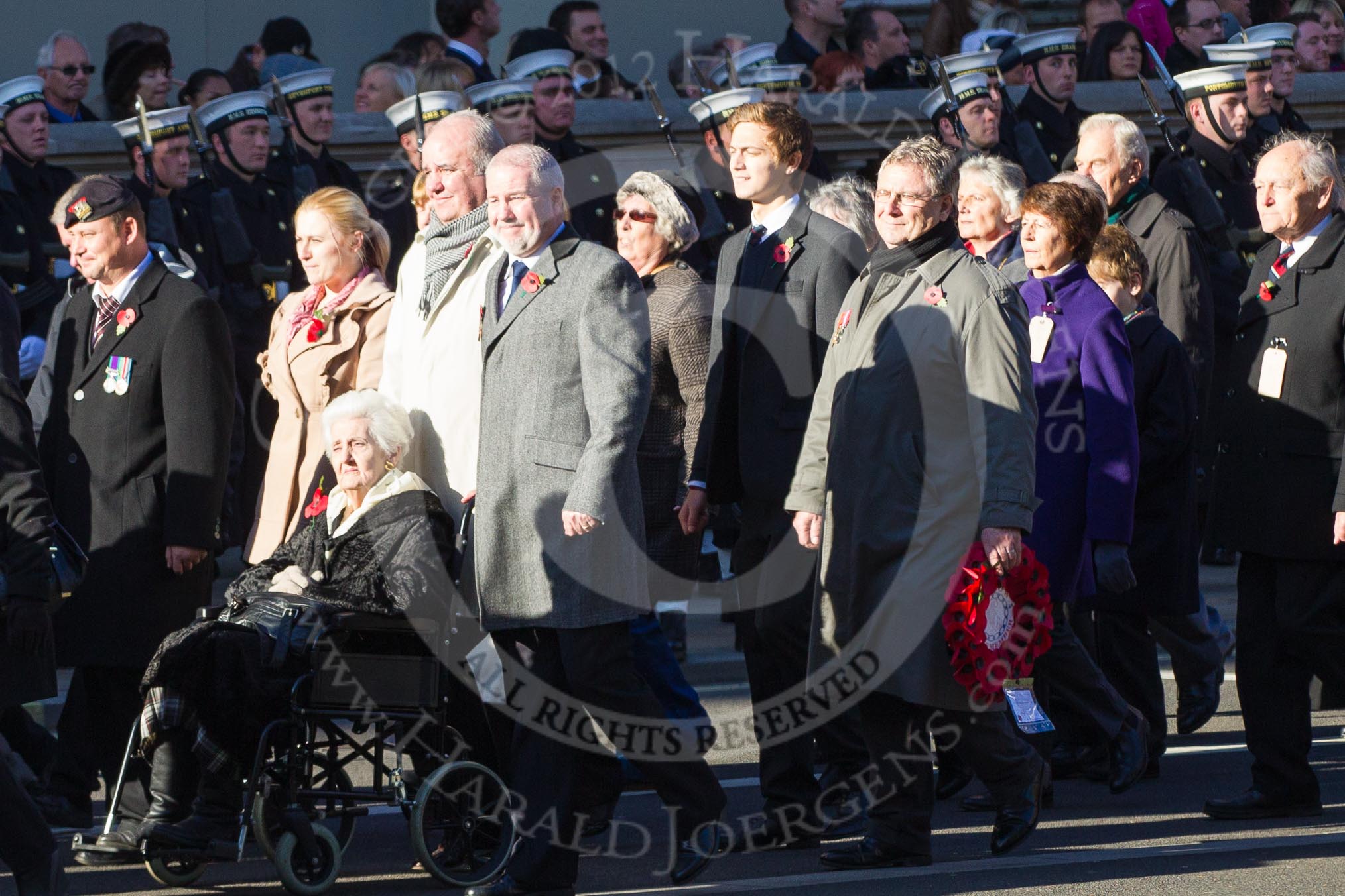 Remembrance Sunday 2012 Cenotaph March Past: Group M5  - Children of the Far East Prisoners of War..
Whitehall, Cenotaph,
London SW1,

United Kingdom,
on 11 November 2012 at 12:09, image #1458