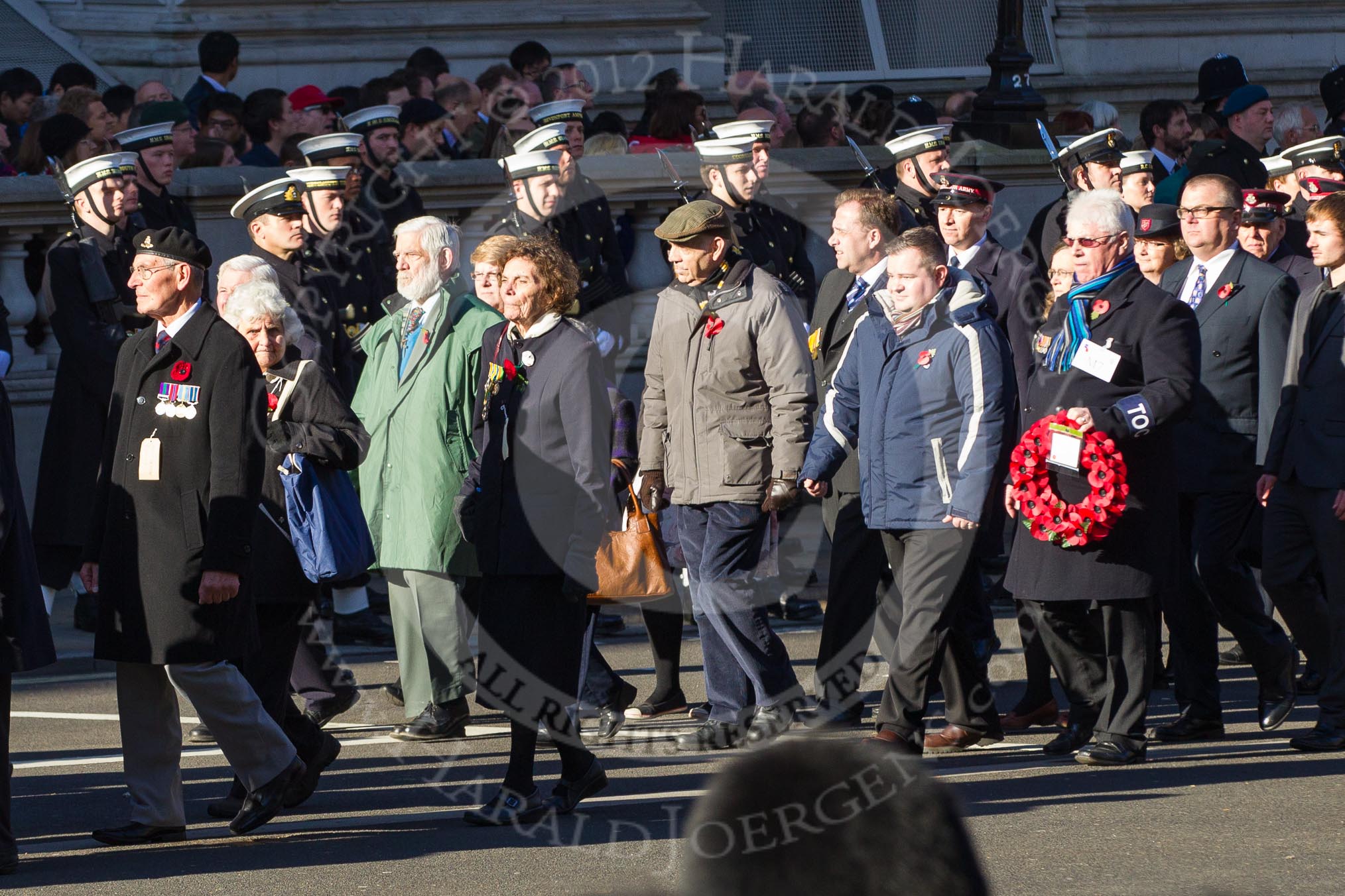 Remembrance Sunday 2012 Cenotaph March Past: Group M6 - Evacuees Reunion Association and M7 - TOC H..
Whitehall, Cenotaph,
London SW1,

United Kingdom,
on 11 November 2012 at 12:10, image #1466