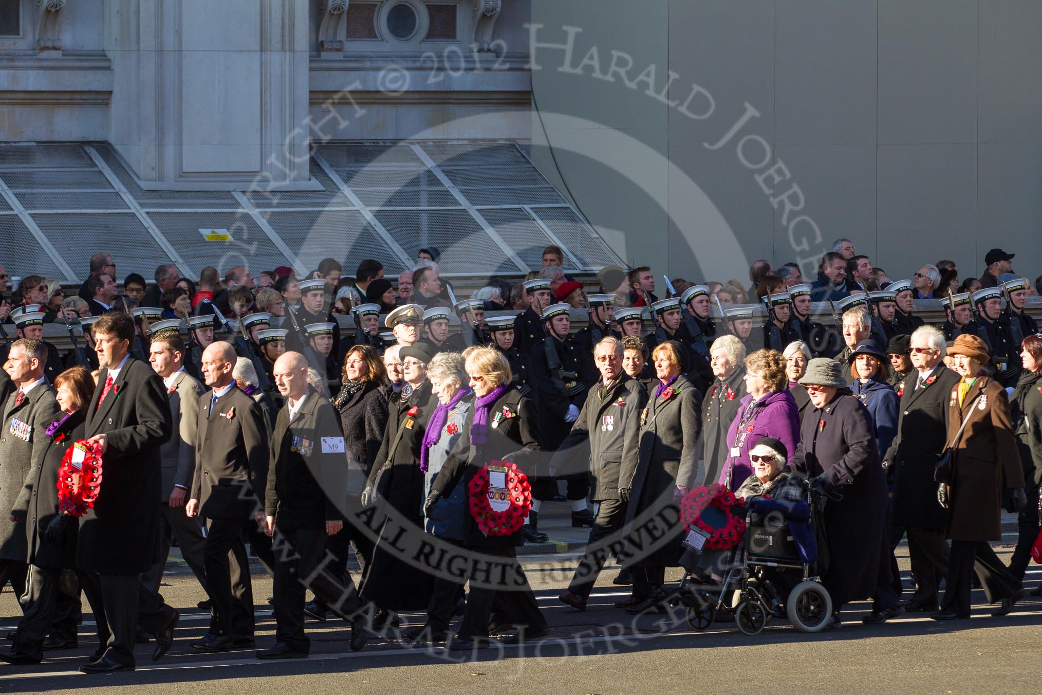 Remembrance Sunday 2012 Cenotaph March Past: Group M9 - NAAFI and M10- Women's Royal Voluntary Service..
Whitehall, Cenotaph,
London SW1,

United Kingdom,
on 11 November 2012 at 12:10, image #1494