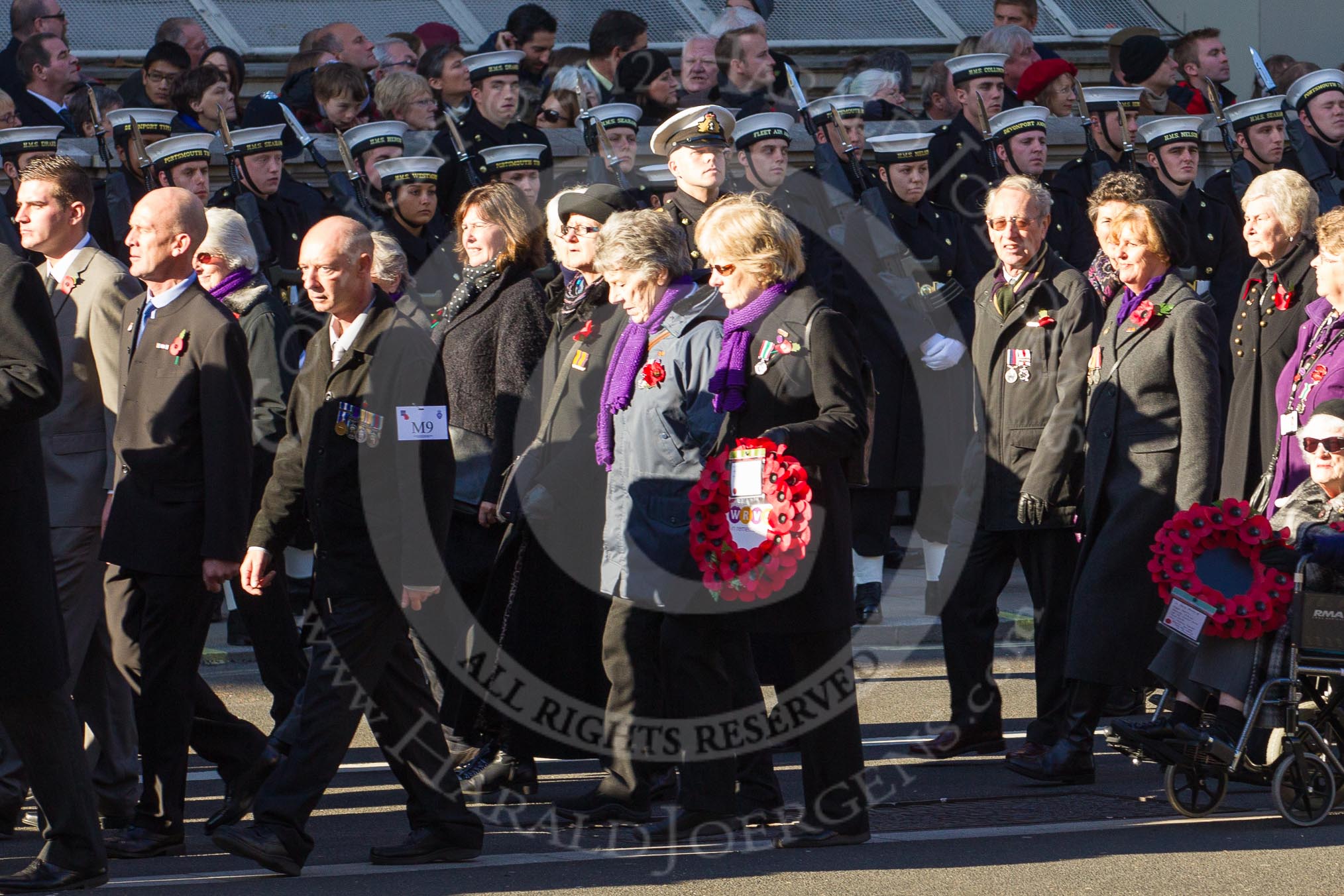 Remembrance Sunday 2012 Cenotaph March Past: Group M9 - NAAFI,  M10- Women's Royal Voluntary Service and M11 - Civil Defence Association..
Whitehall, Cenotaph,
London SW1,

United Kingdom,
on 11 November 2012 at 12:10, image #1495