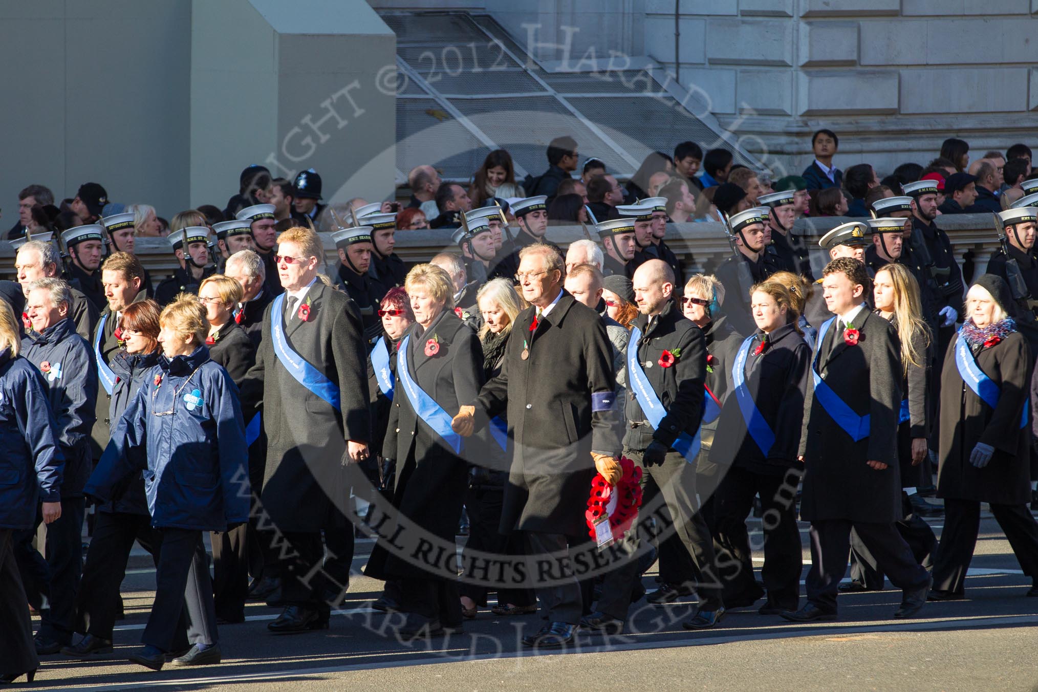 Remembrance Sunday 2012 Cenotaph March Past: Group M26 - The Blue Cross and M27 - PDSA..
Whitehall, Cenotaph,
London SW1,

United Kingdom,
on 11 November 2012 at 12:13, image #1601