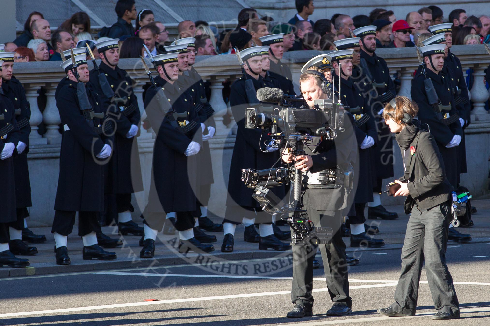 Remembrance Sunday 2012 Cenotaph March Past: The BBC/SIS steadycam man that did all the close-ups for the live broadcast..
Whitehall, Cenotaph,
London SW1,

United Kingdom,
on 11 November 2012 at 12:16, image #1766