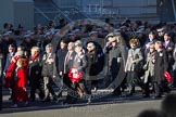 Remembrance Sunday 2012 Cenotaph March Past: Group M34 - RBL Non Ex-Service Members, M35 - Union Jack Club, and M36 - Shot at Dawn Pardons Campaign..
Whitehall, Cenotaph,
London SW1,

United Kingdom,
on 11 November 2012 at 12:13, image #1635