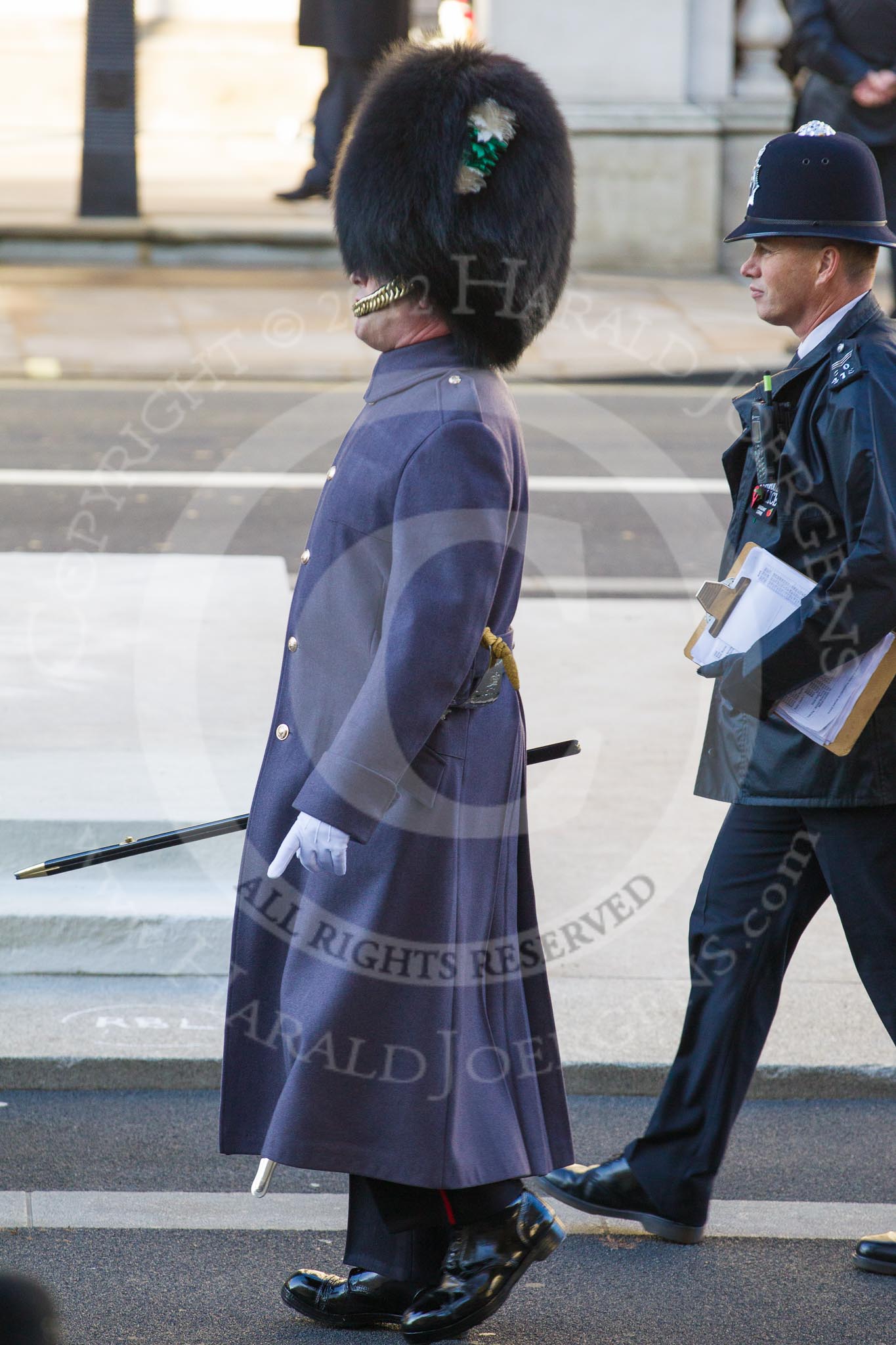 Garrison Sergeant Major William Mott OBE, the senior Warrant Officer of the British Army responsible for all state ceremonial events, and a sergeant of the Metropolitan Police, during the last preparations for the event.