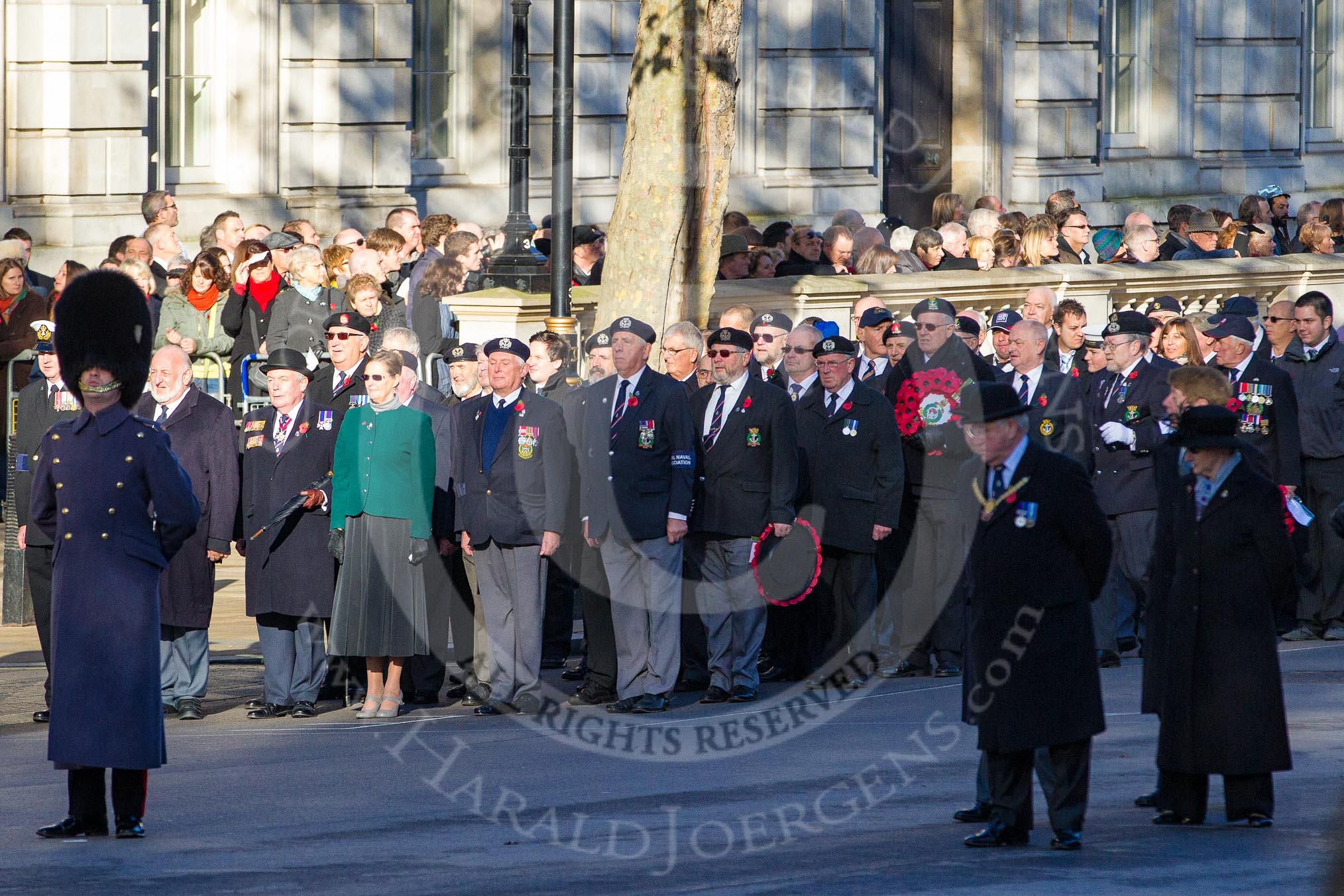 The column of ex-Servicemen and women in position at Whitehall. The head of the civilian column is at the right.