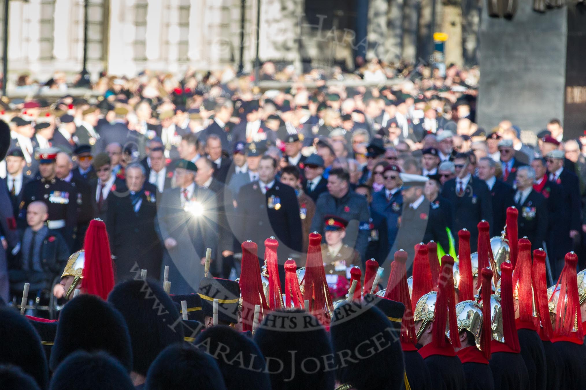 The sun reflecting in the medals of an ex-Serviceman.