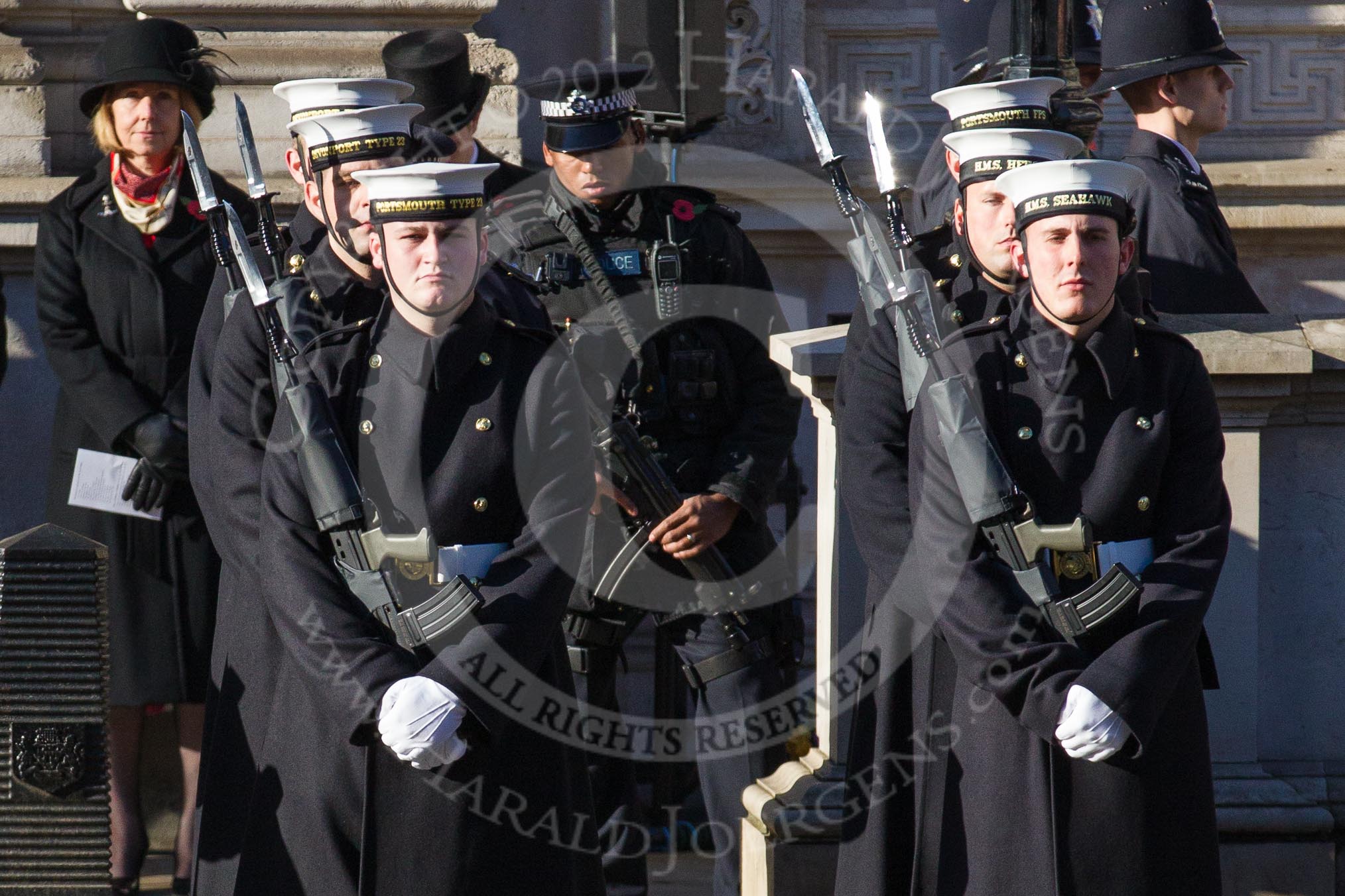 Reflections of the sun on a bayonet.