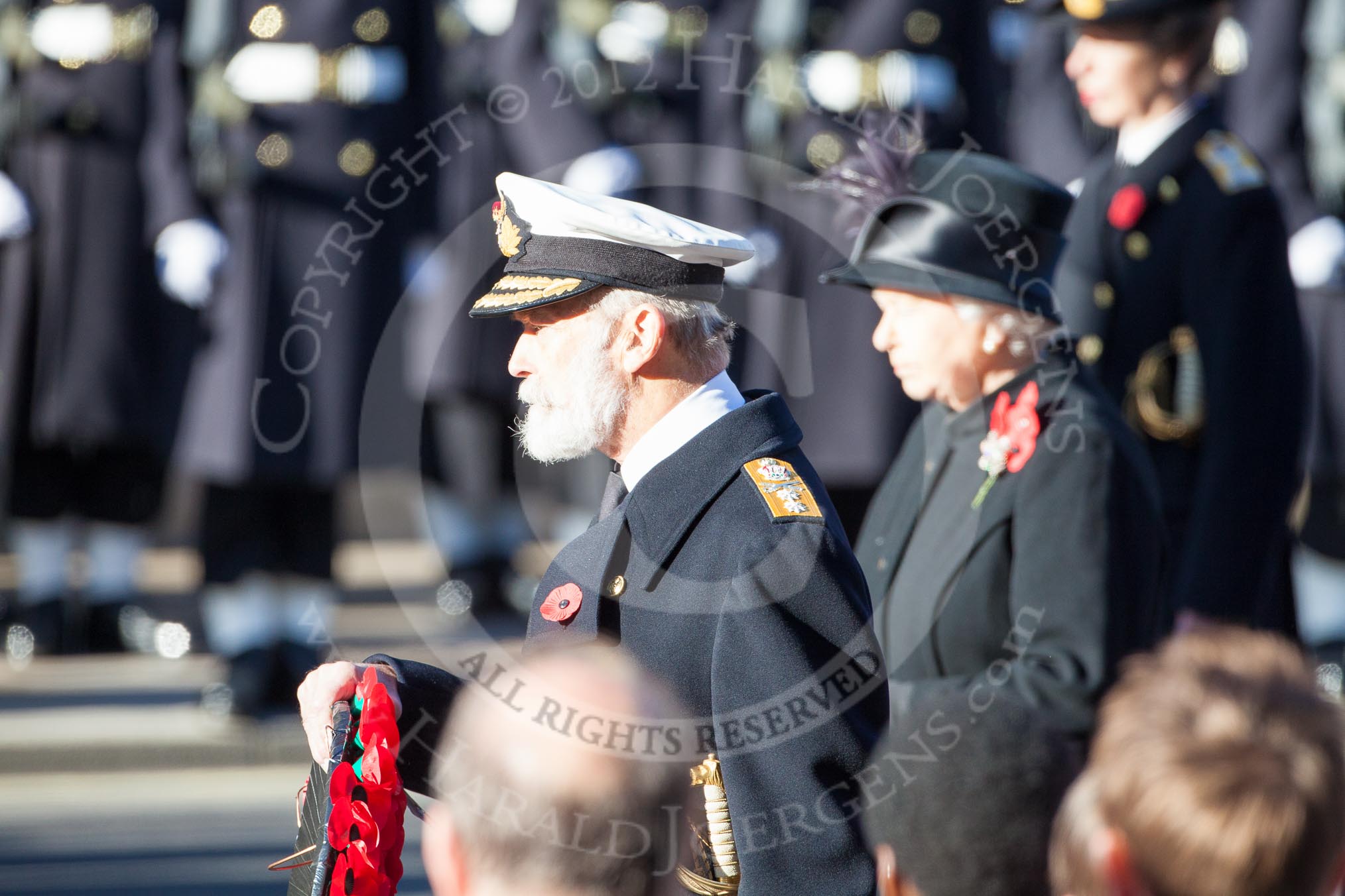 HRH Prince Michael of Kent about to lay his wreath at the Cenotaph. Behind him, and out of focus, HM The Queen.