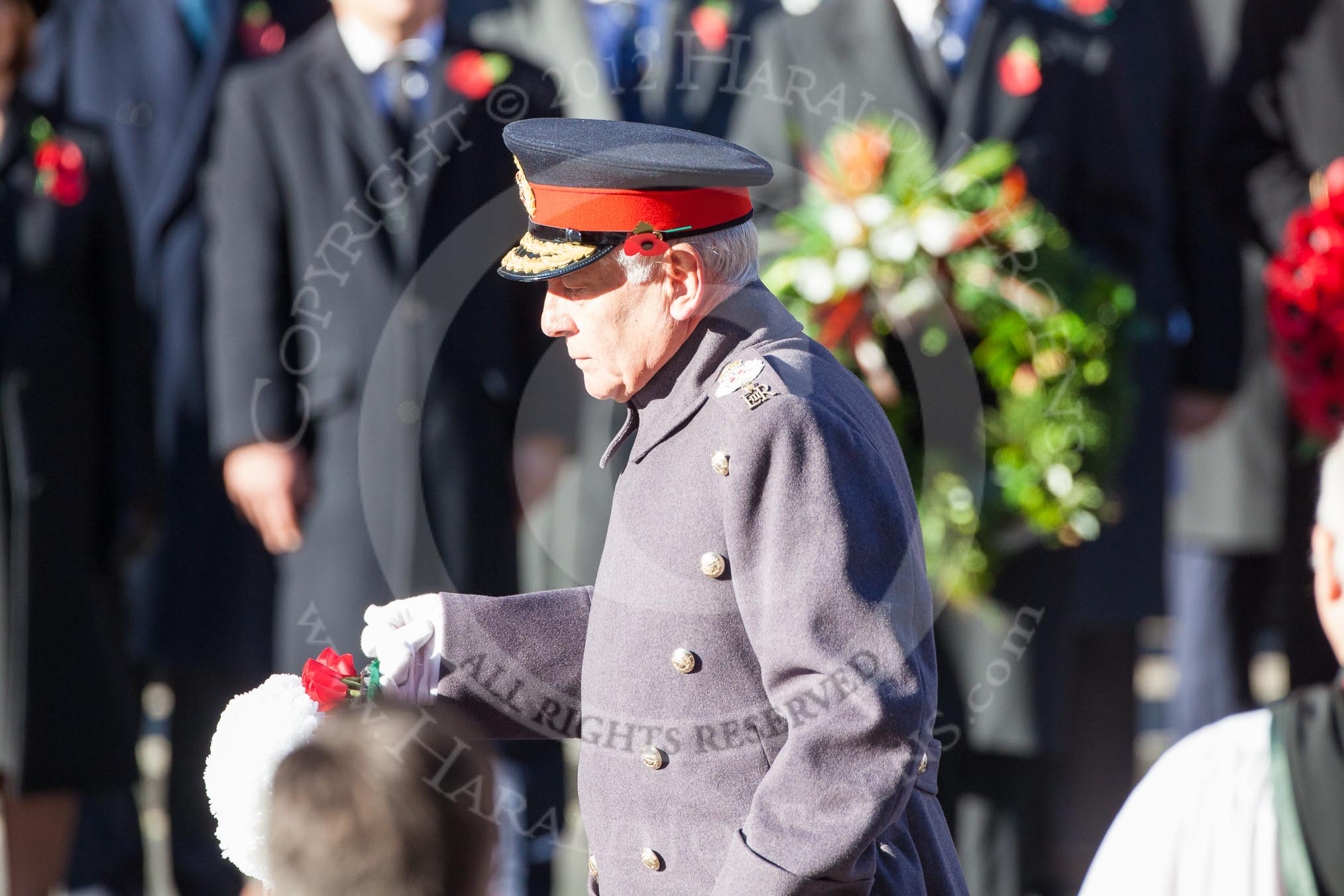 Field Marshal the Lord Guthrie of Craigiesbank, representing the absent Prince of Wales, about to lay his wreath at the Cenotaph.