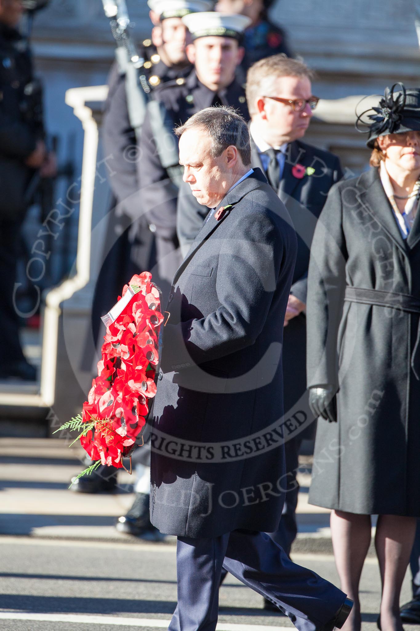 Nigel Dodds, as the Deputy Leader of the Democratic Unionist Party, about to lau a wreath at the Cenotaph.