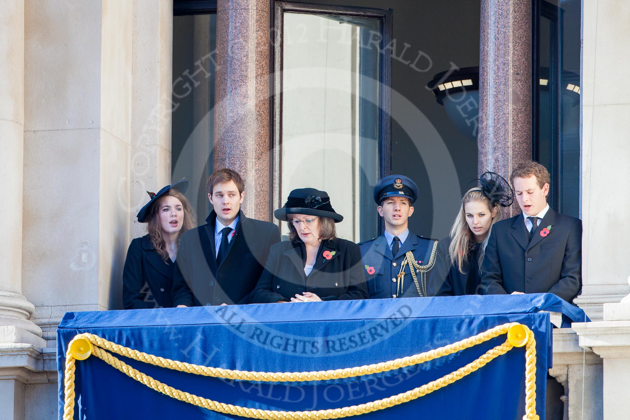 Guests singing on one of the balconies of the Foreign- and Commonweath Office building during the service by the Bishop of London.