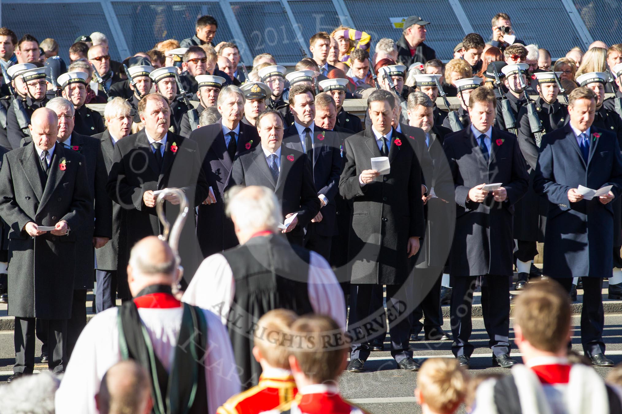 Government members singing during the service by the Bishop of London.