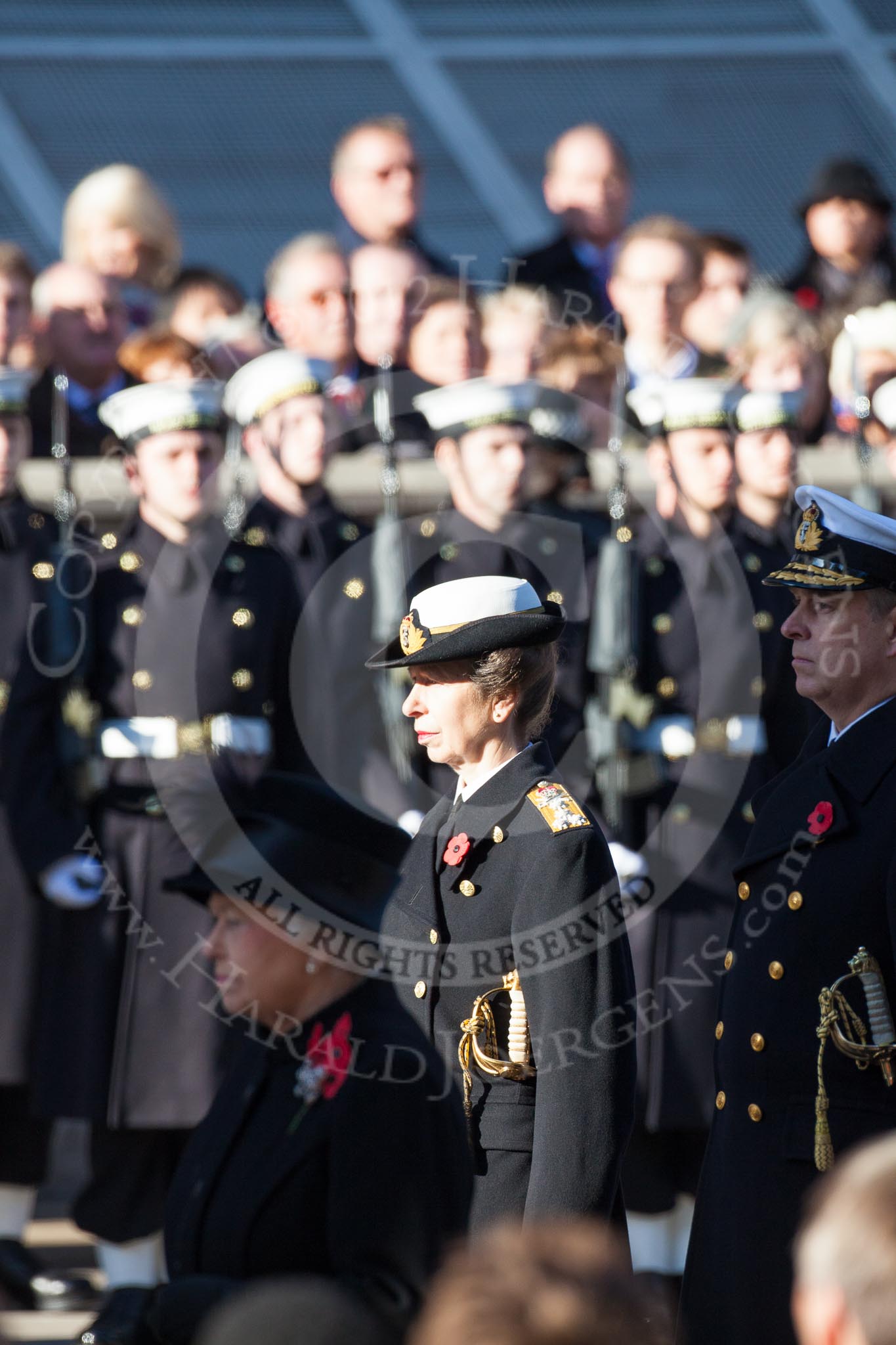 HRH The Pricess Royal and HRH The Duke of York during the service by the Bishop of London. In the foreground and out of focus HM The Queen.