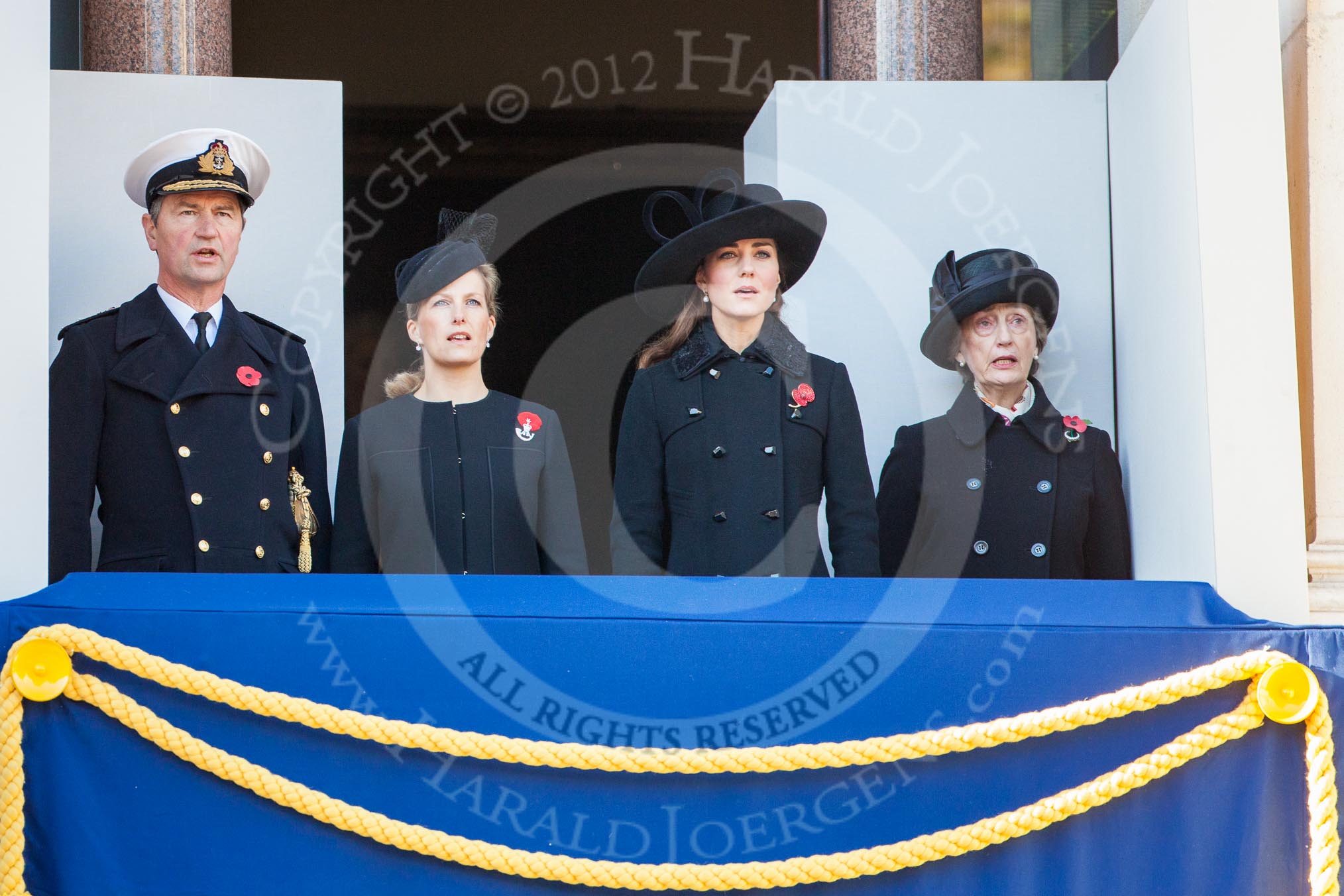 On the balcony Sir Timothy Lawrence, husband of the Princess Royal, HRH The Countess of Wessex, and HRH The Dutchess of Cambridge, singing during the service by the Bishop of London.