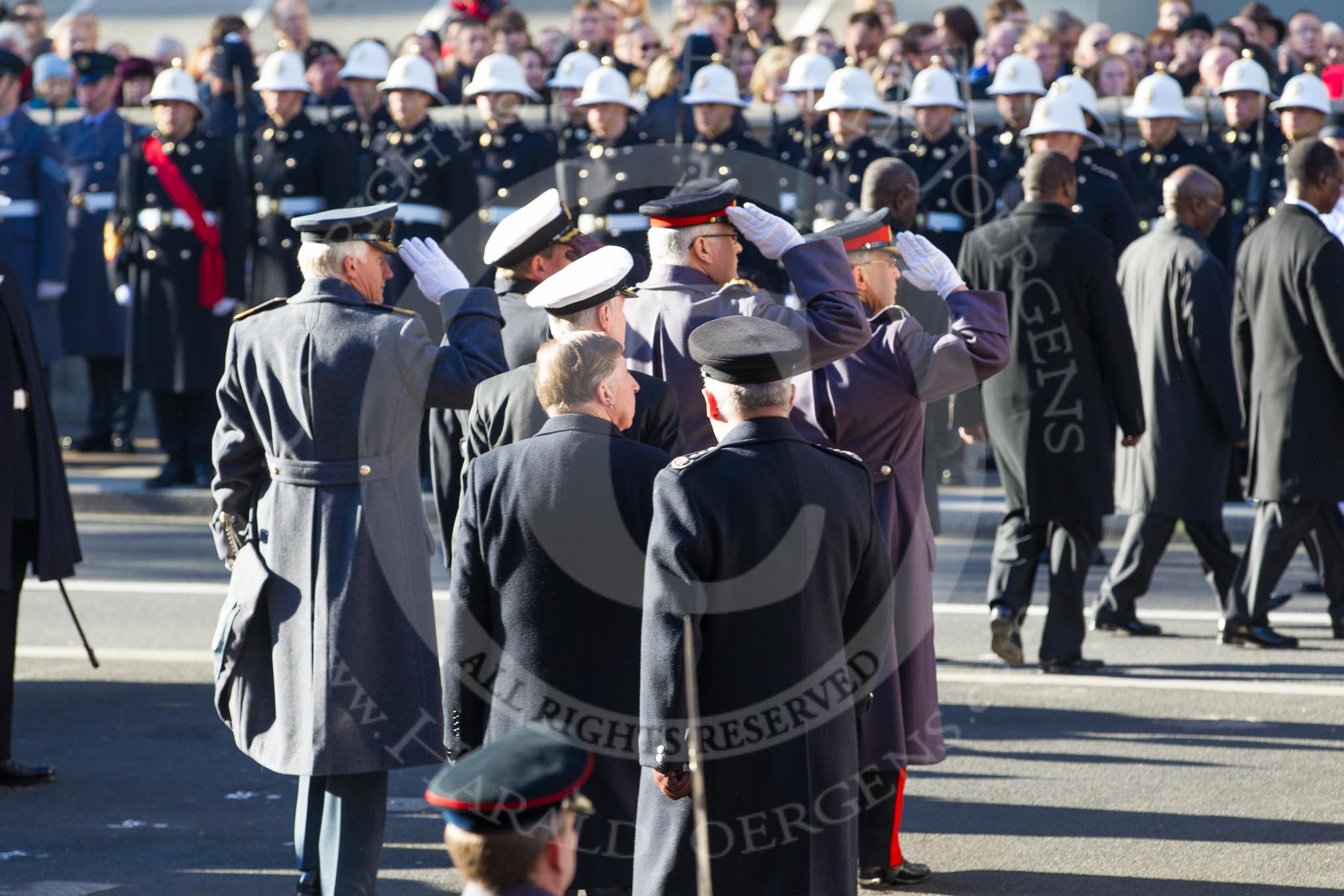 The four Chiefs of Staff of the Armed Forces about to leave Whitehall after the service, saluting at the Cenotaph.