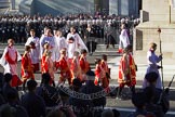 The Choir, led by the Cross Bearer, Jack Fonseca-Burtt, followed by 10 children of the Chapel Royal, is followed by 6 Gentlemen-in-Ordinary, the Choirmaster, Dr Andrew Gant, the Serjeant of the Vestry, David Baldwin RVM, and the Forces Chaplain.