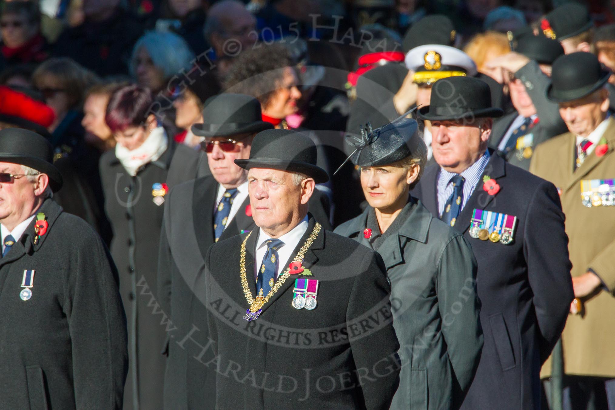 Remembrance Sunday Cenotaph March Past 2013: Waiting for the March Past to begin..
Press stand opposite the Foreign Office building, Whitehall, London SW1,
London,
Greater London,
United Kingdom,
on 10 November 2013 at 11:30, image #8