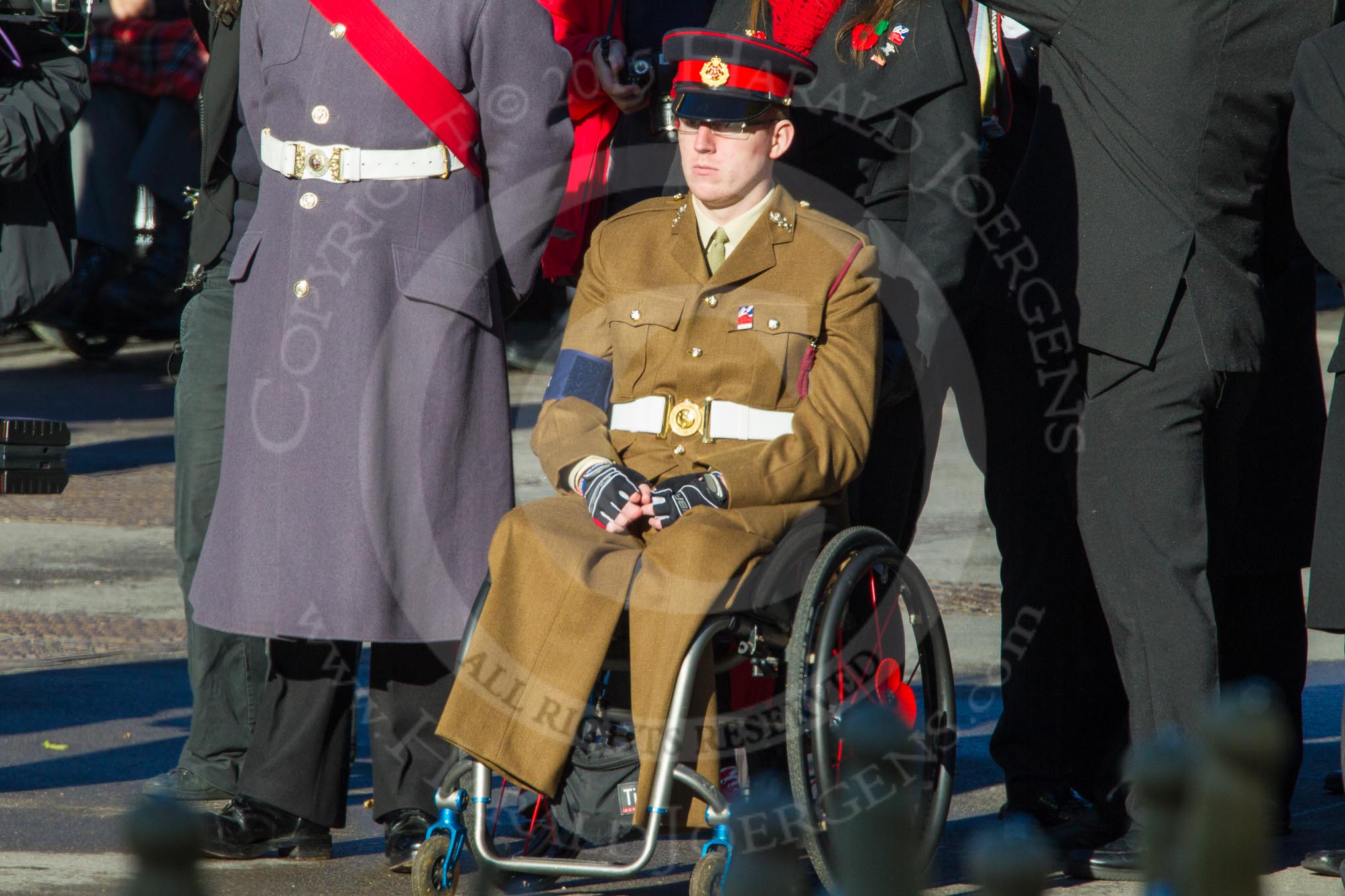 Remembrance Sunday Cenotaph March Past 2013: Waiting for the March Past to begin..
Press stand opposite the Foreign Office building, Whitehall, London SW1,
London,
Greater London,
United Kingdom,
on 10 November 2013 at 11:31, image #9