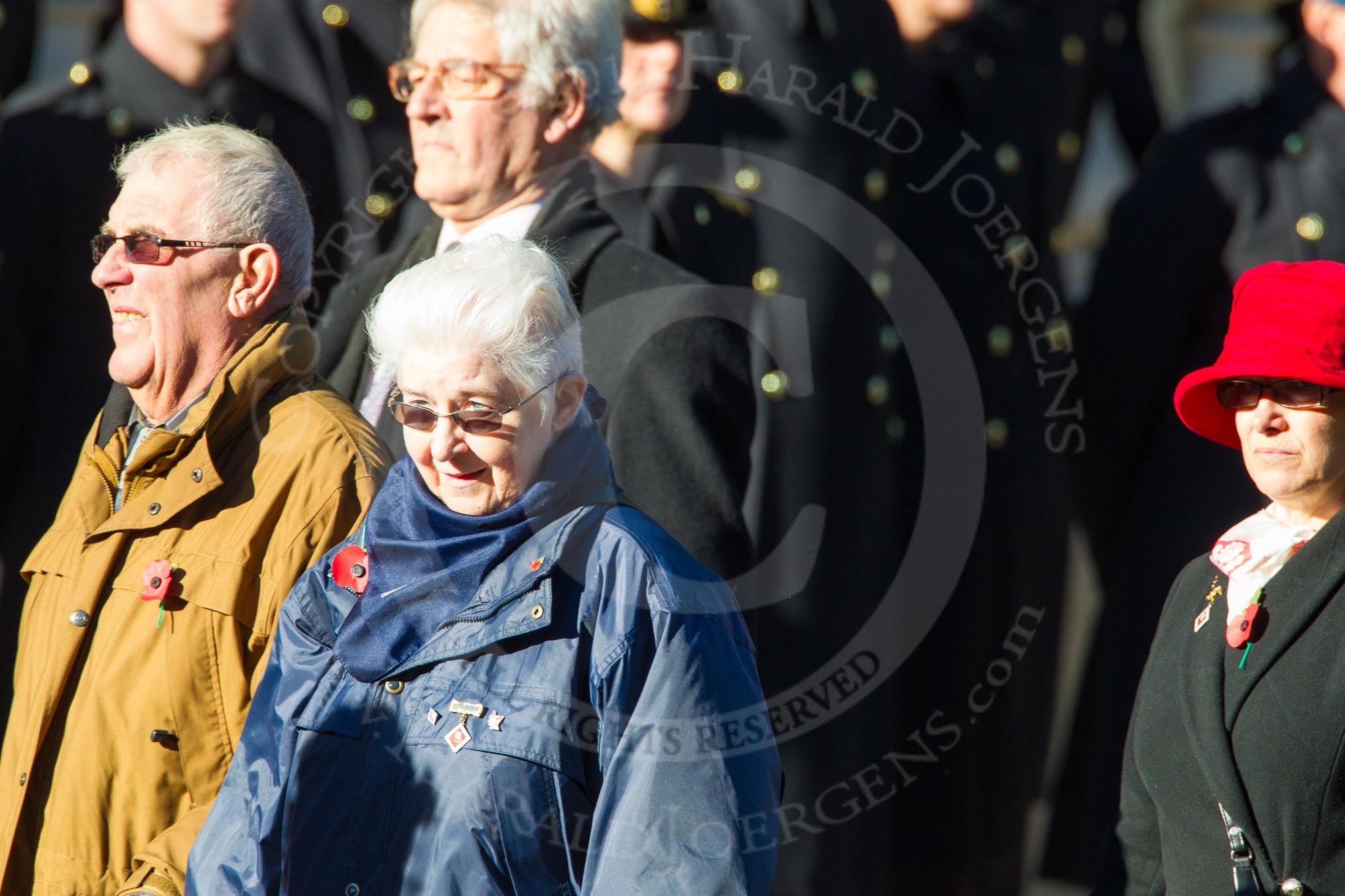 Photo 1311101138461D48036HaraldJoergens Remembrance Sunday Cenotaph March Past 2013: D1 - War Widows Association. The lady in the red hat is Debbie Bowles, WWA Committee member and current WWA treasurer..
Press stand opposite the Foreign Office building, Whitehall, London SW1,
London,
Greater London,
United Kingdom,
on 10 November 2013 at 11:38, image #30