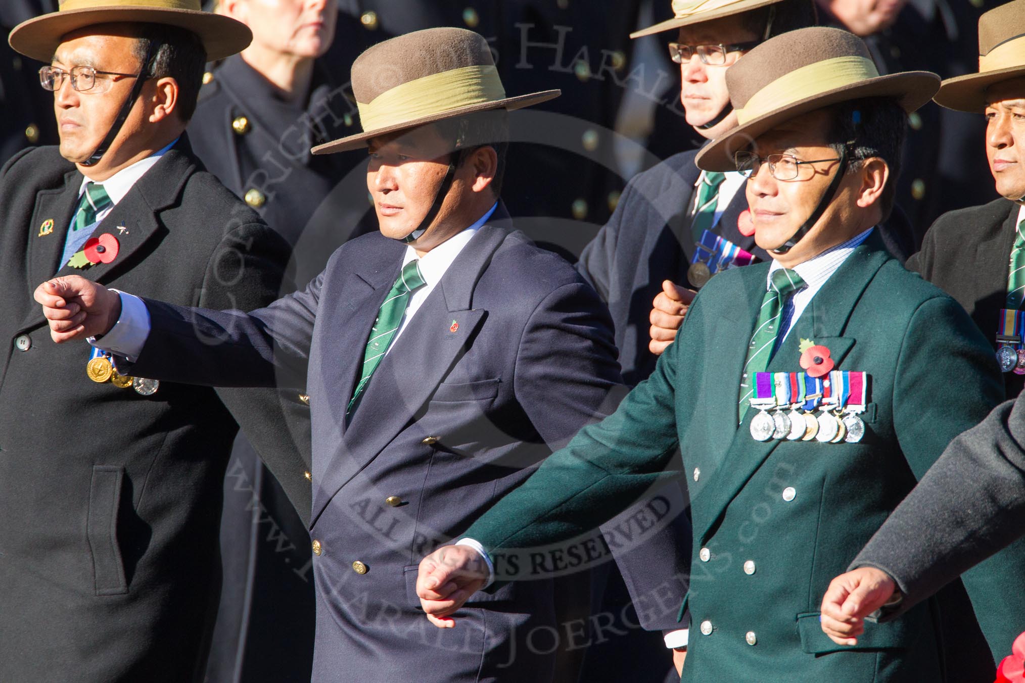 Remembrance Sunday Cenotaph March Past 2013: D2 - British Gurkha Welfare Association..
Press stand opposite the Foreign Office building, Whitehall, London SW1,
London,
Greater London,
United Kingdom,
on 10 November 2013 at 11:38, image #31