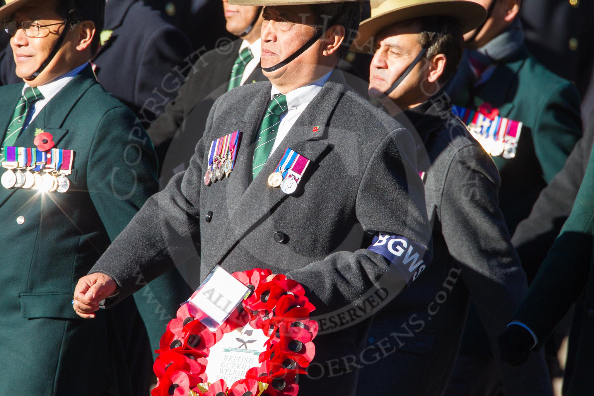 Remembrance Sunday Cenotaph March Past 2013: D2 - British Gurkha Welfare Association..
Press stand opposite the Foreign Office building, Whitehall, London SW1,
London,
Greater London,
United Kingdom,
on 10 November 2013 at 11:38, image #34