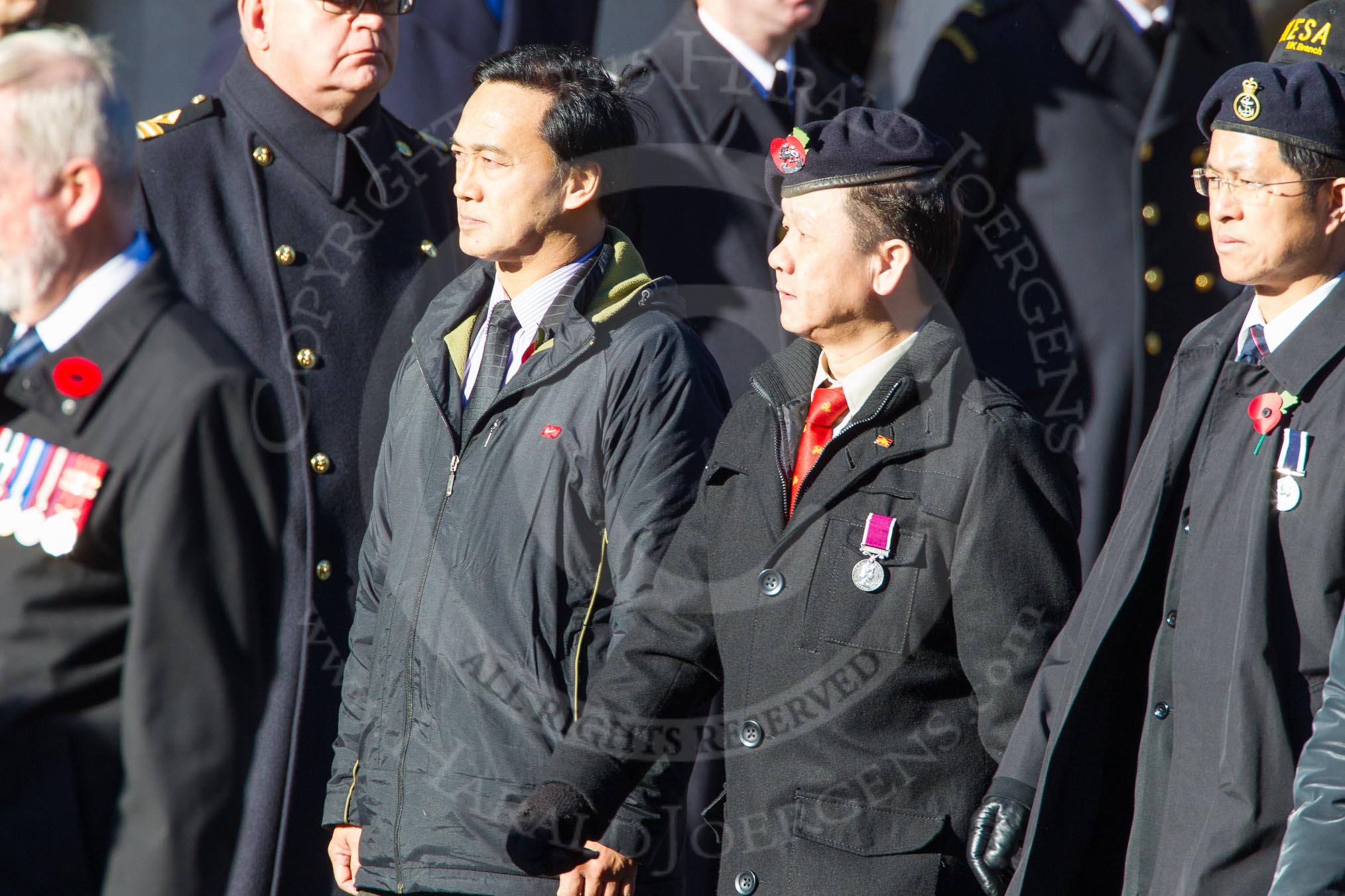 Remembrance Sunday Cenotaph March Past 2013: D9 - Hong Kong Ex-Servicemen's Association (UK Branch)..
Press stand opposite the Foreign Office building, Whitehall, London SW1,
London,
Greater London,
United Kingdom,
on 10 November 2013 at 11:39, image #75