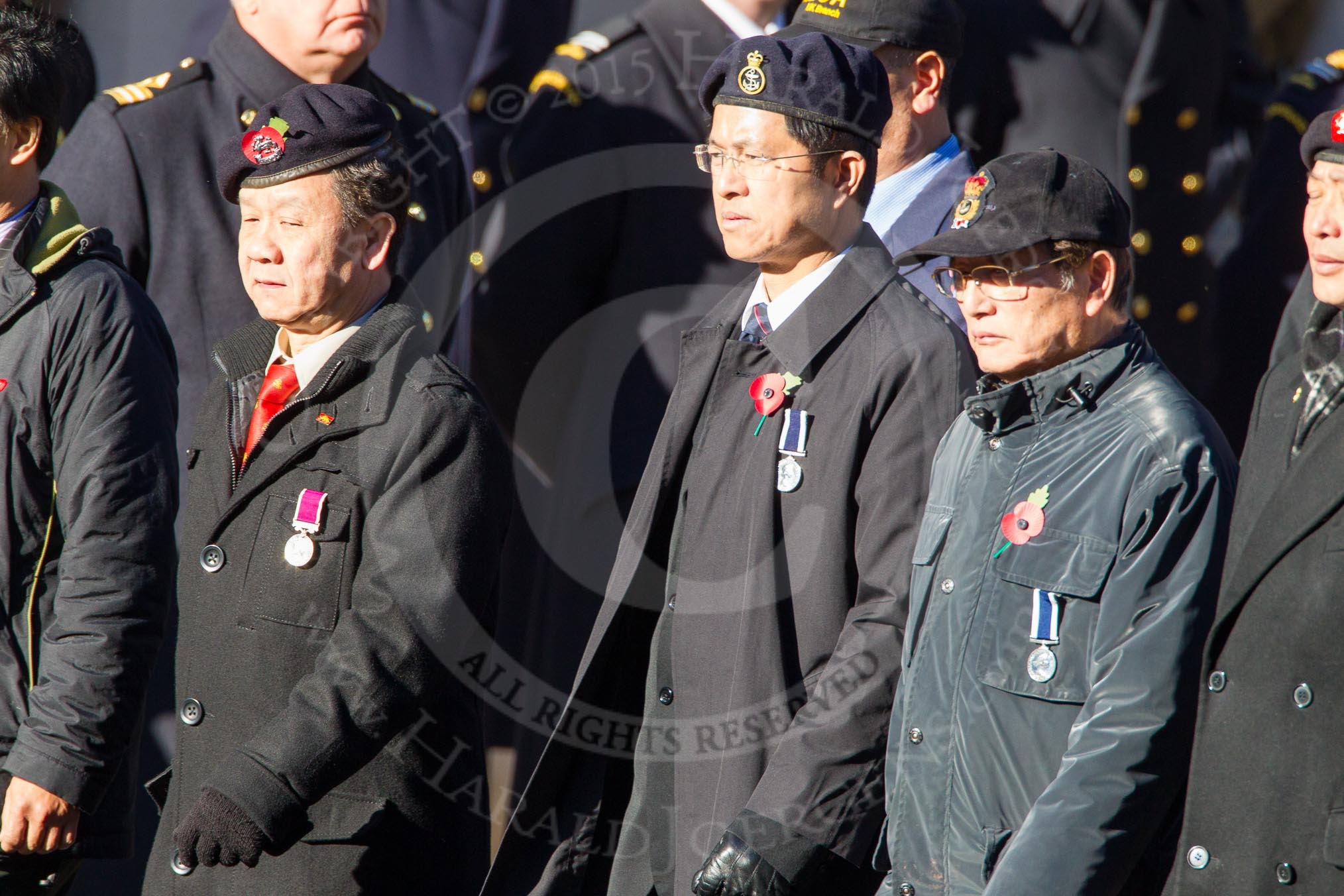 Remembrance Sunday Cenotaph March Past 2013: D9 - Hong Kong Ex-Servicemen's Association (UK Branch)..
Press stand opposite the Foreign Office building, Whitehall, London SW1,
London,
Greater London,
United Kingdom,
on 10 November 2013 at 11:39, image #76