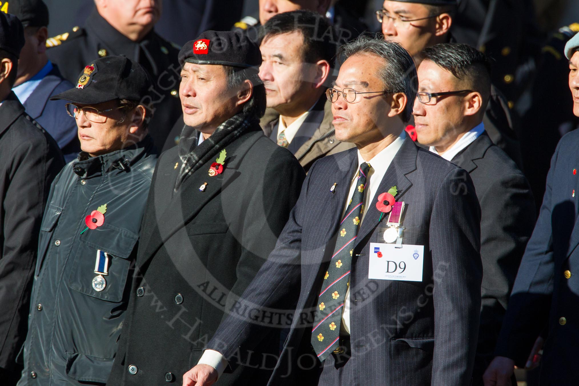 Remembrance Sunday Cenotaph March Past 2013: D9 - Hong Kong Ex-Servicemen's Association (UK Branch)..
Press stand opposite the Foreign Office building, Whitehall, London SW1,
London,
Greater London,
United Kingdom,
on 10 November 2013 at 11:39, image #77