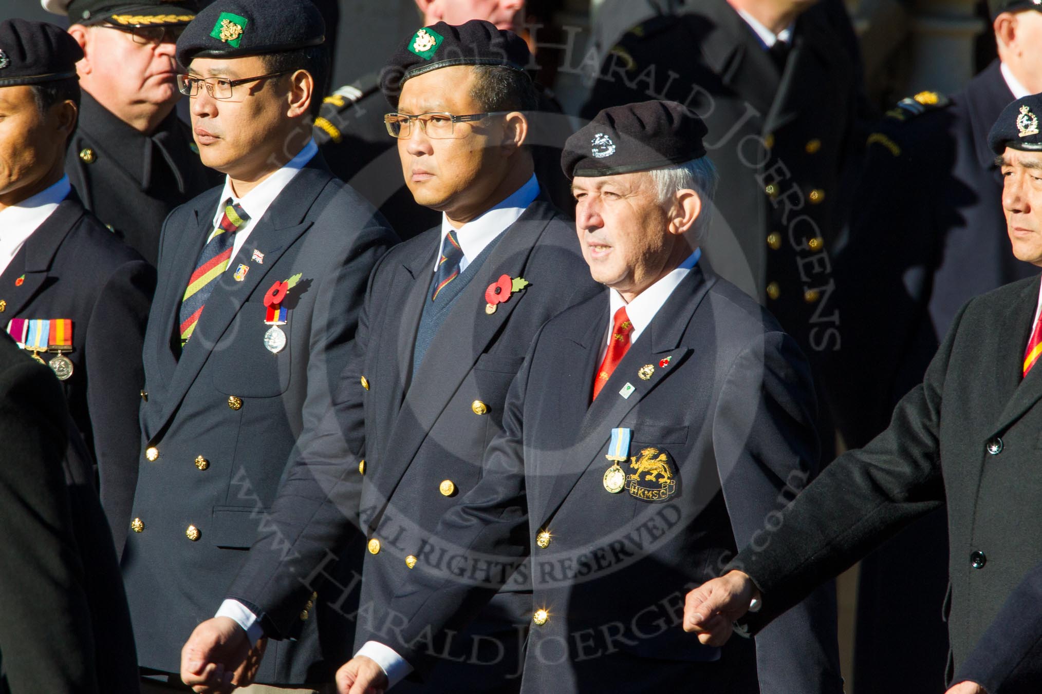 Remembrance Sunday Cenotaph March Past 2013: D10 - Hong Kong Military Service Corps..
Press stand opposite the Foreign Office building, Whitehall, London SW1,
London,
Greater London,
United Kingdom,
on 10 November 2013 at 11:39, image #82