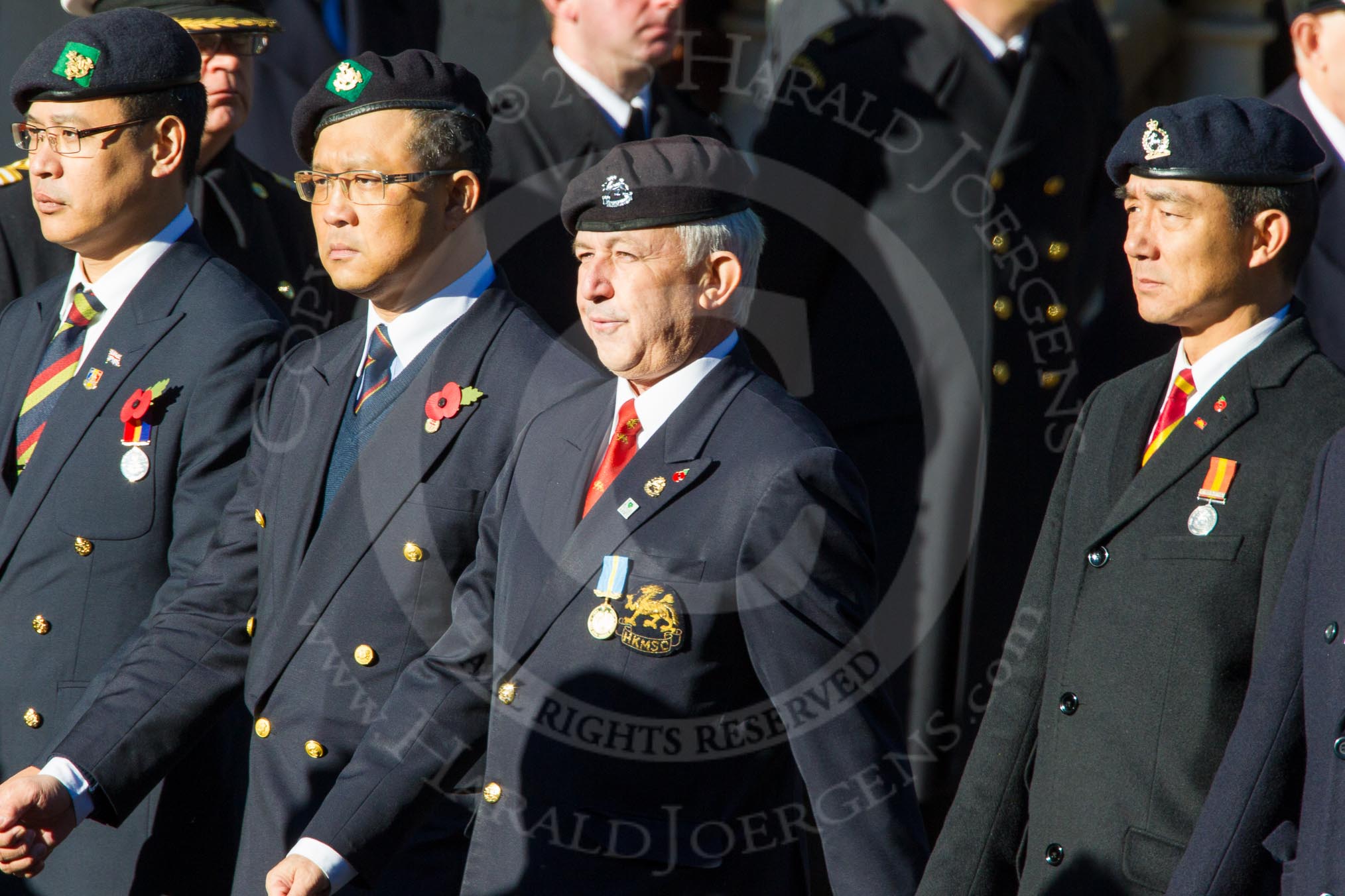 Remembrance Sunday Cenotaph March Past 2013: D10 - Hong Kong Military Service Corps..
Press stand opposite the Foreign Office building, Whitehall, London SW1,
London,
Greater London,
United Kingdom,
on 10 November 2013 at 11:39, image #83