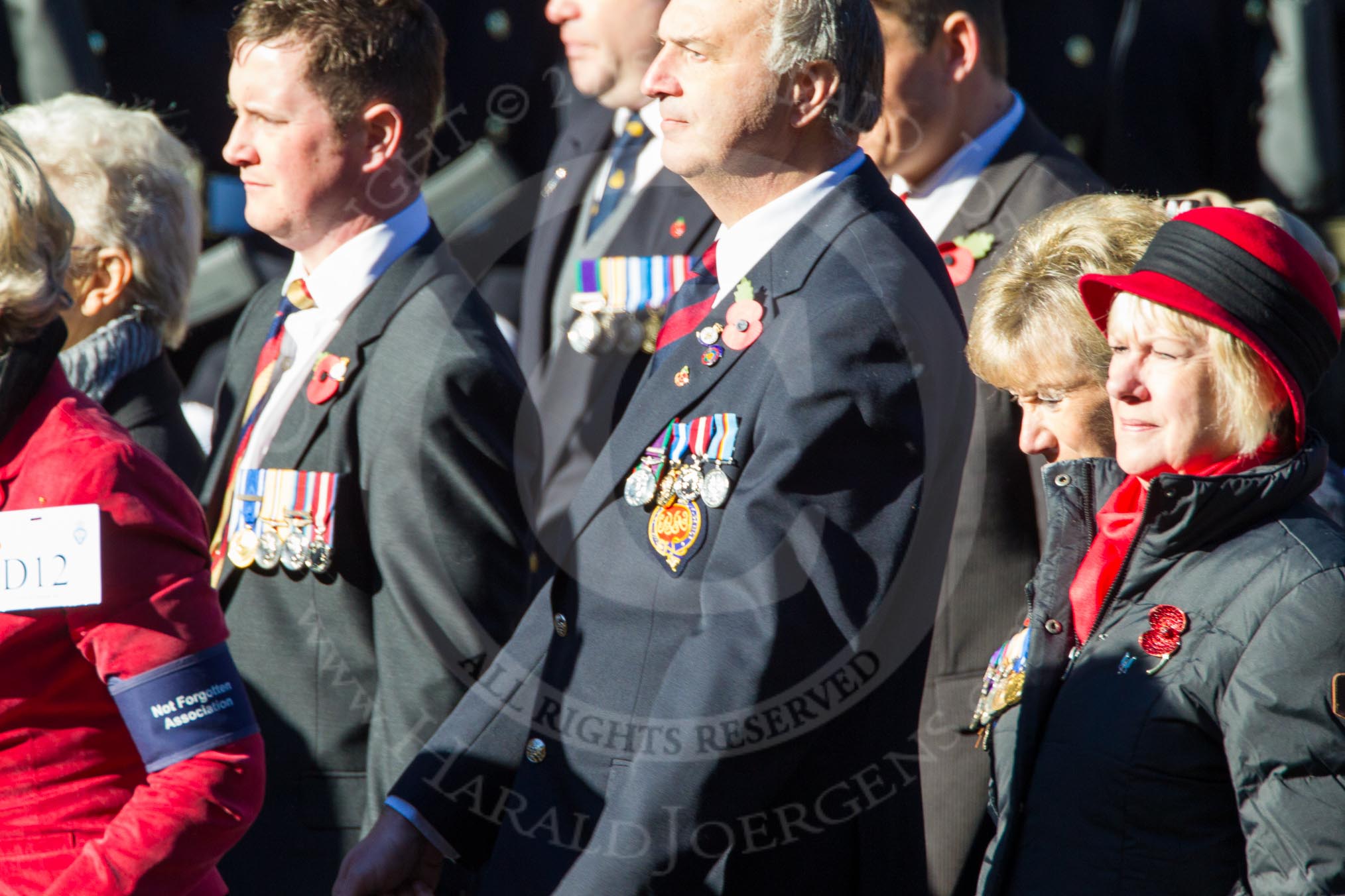Remembrance Sunday Cenotaph March Past 2013: D12 - Not Forgotten Association..
Press stand opposite the Foreign Office building, Whitehall, London SW1,
London,
Greater London,
United Kingdom,
on 10 November 2013 at 11:39, image #92