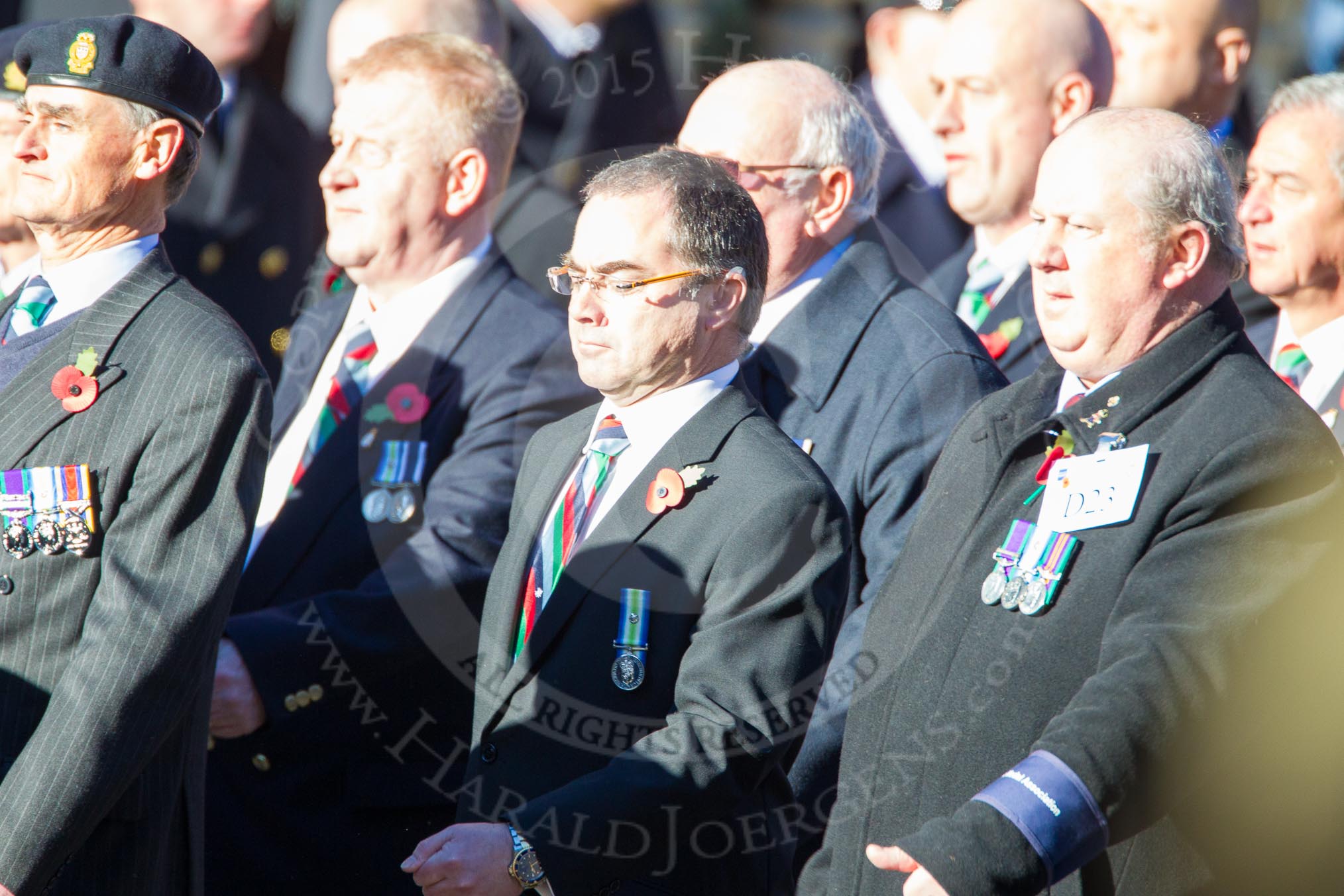 Remembrance Sunday Cenotaph March Past 2013: D23 - South Atlantic Medal Association (SAMA 82): The South Atlantic Medal (1982) is the official name of the medal awarded to almost 30,000 service men and women - and civilians - who took part in the campaign to liberate the Falkland Islands in 1982. The South Atlantic Medal Association is their Association..
Press stand opposite the Foreign Office building, Whitehall, London SW1,
London,
Greater London,
United Kingdom,
on 10 November 2013 at 11:41, image #168