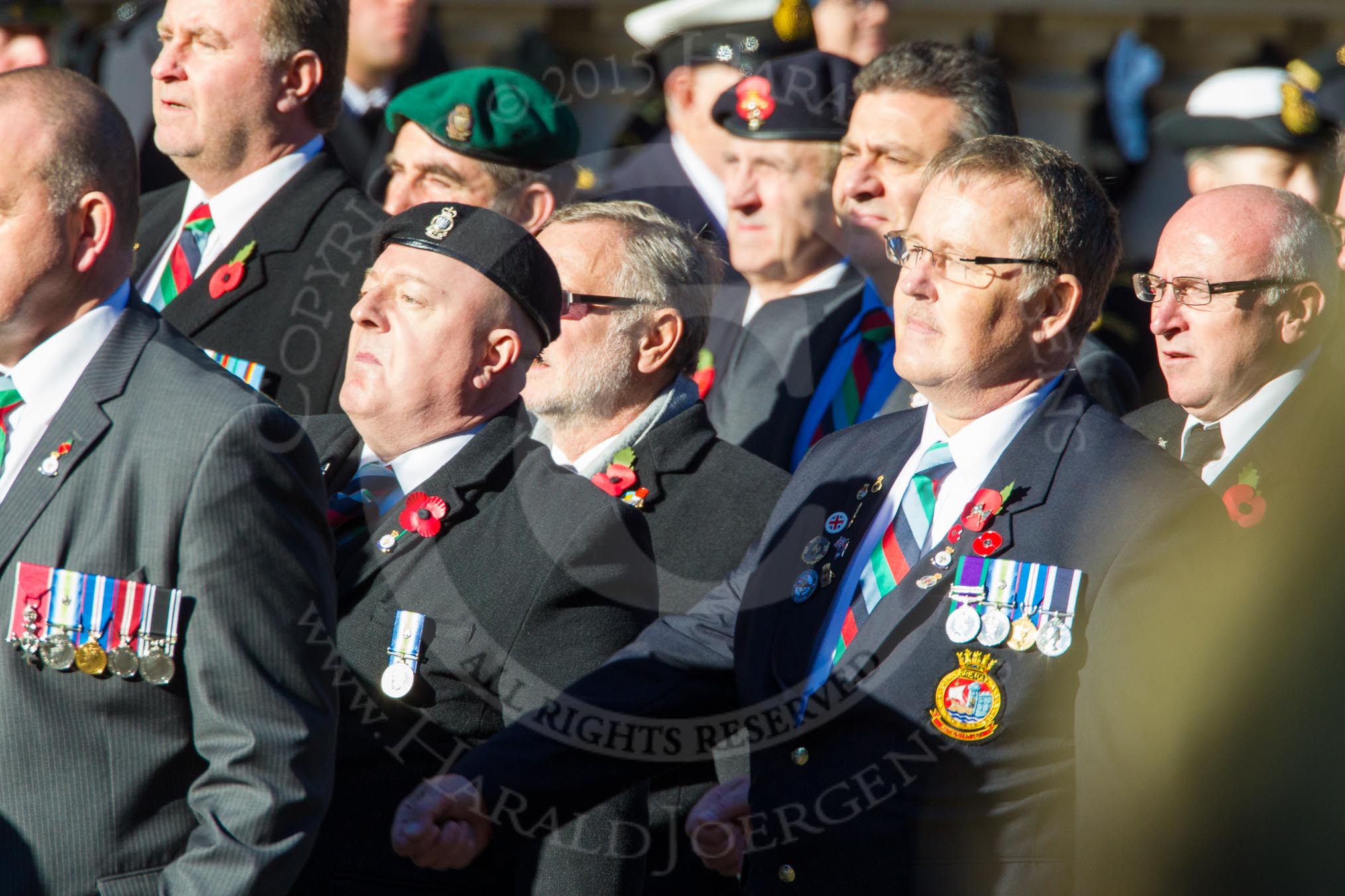 Remembrance Sunday Cenotaph March Past 2013: D23 - South Atlantic Medal Association (SAMA 82): The South Atlantic Medal (1982) is the official name of the medal awarded to almost 30,000 service men and women - and civilians - who took part in the campaign to liberate the Falkland Islands in 1982. The South Atlantic Medal Association is their Association..
Press stand opposite the Foreign Office building, Whitehall, London SW1,
London,
Greater London,
United Kingdom,
on 10 November 2013 at 11:41, image #172