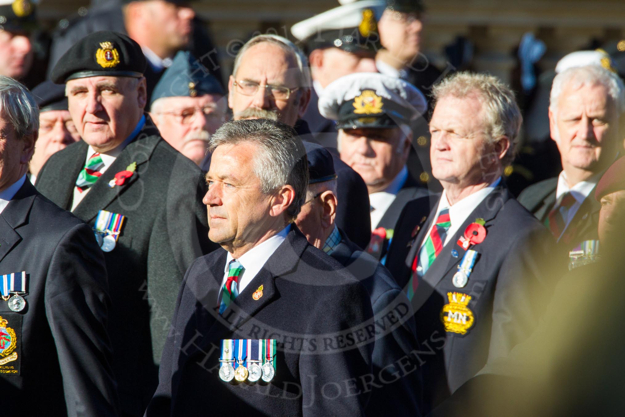 Remembrance Sunday Cenotaph March Past 2013: D23 - South Atlantic Medal Association (SAMA 82): The South Atlantic Medal (1982) is the official name of the medal awarded to almost 30,000 service men and women - and civilians - who took part in the campaign to liberate the Falkland Islands in 1982. The South Atlantic Medal Association is their Association..
Press stand opposite the Foreign Office building, Whitehall, London SW1,
London,
Greater London,
United Kingdom,
on 10 November 2013 at 11:41, image #176