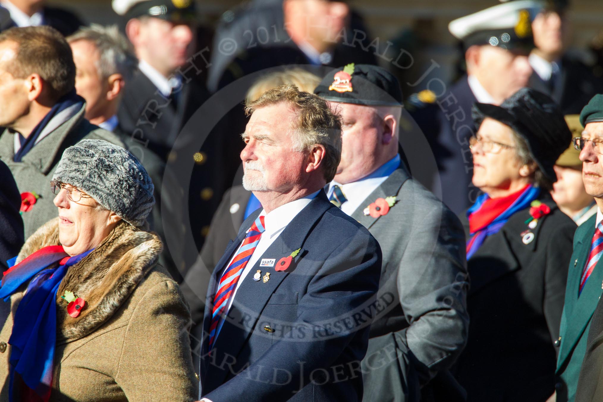 Remembrance Sunday Cenotaph March Past 2013: D24 - SSAFA Forces Help, set up to help former and serving members of the British Armed Forces and their families or dependants..
Press stand opposite the Foreign Office building, Whitehall, London SW1,
London,
Greater London,
United Kingdom,
on 10 November 2013 at 11:41, image #199
