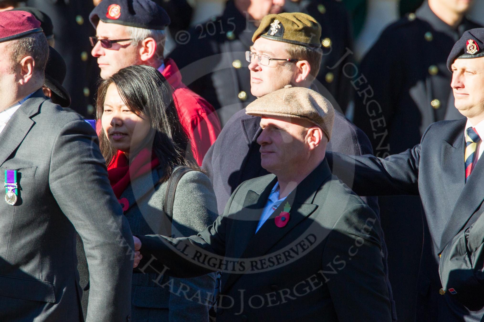 Remembrance Sunday Cenotaph March Past 2013: D34 - Walking With The Wounded. Walking With The Wounded stage international expeditions to raise awareness and funds to support the education and retraining of Wounded Service personnel who are forced to leave the Armed Forces due to their injuries..
Press stand opposite the Foreign Office building, Whitehall, London SW1,
London,
Greater London,
United Kingdom,
on 10 November 2013 at 11:43, image #310