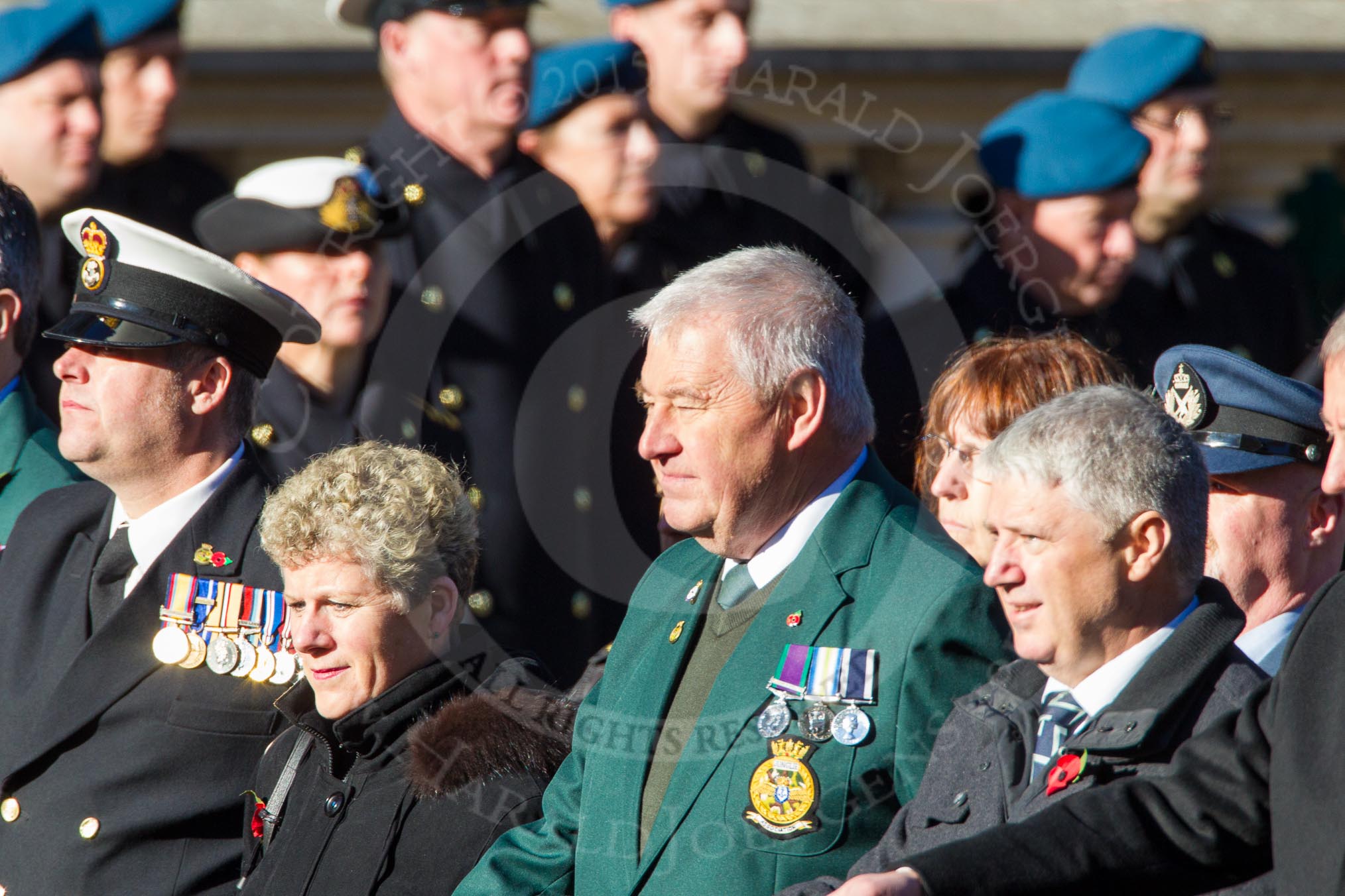 Remembrance Sunday Cenotaph March Past 2013: E12 - Fleet Air Arm Junglie Association..
Press stand opposite the Foreign Office building, Whitehall, London SW1,
London,
Greater London,
United Kingdom,
on 10 November 2013 at 11:45, image #461