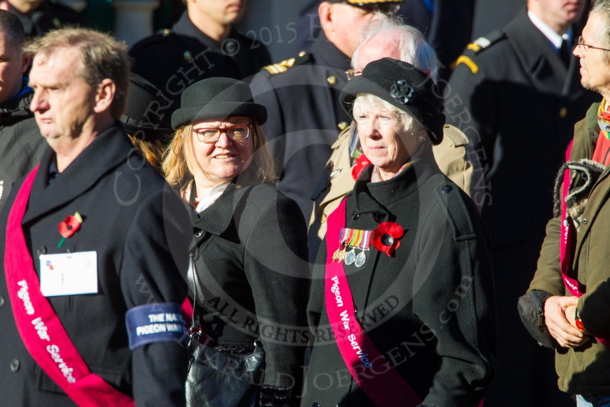 Remembrance Sunday Cenotaph March Past 2013: F8 - National Pigeon War Service..
Press stand opposite the Foreign Office building, Whitehall, London SW1,
London,
Greater London,
United Kingdom,
on 10 November 2013 at 11:51, image #810