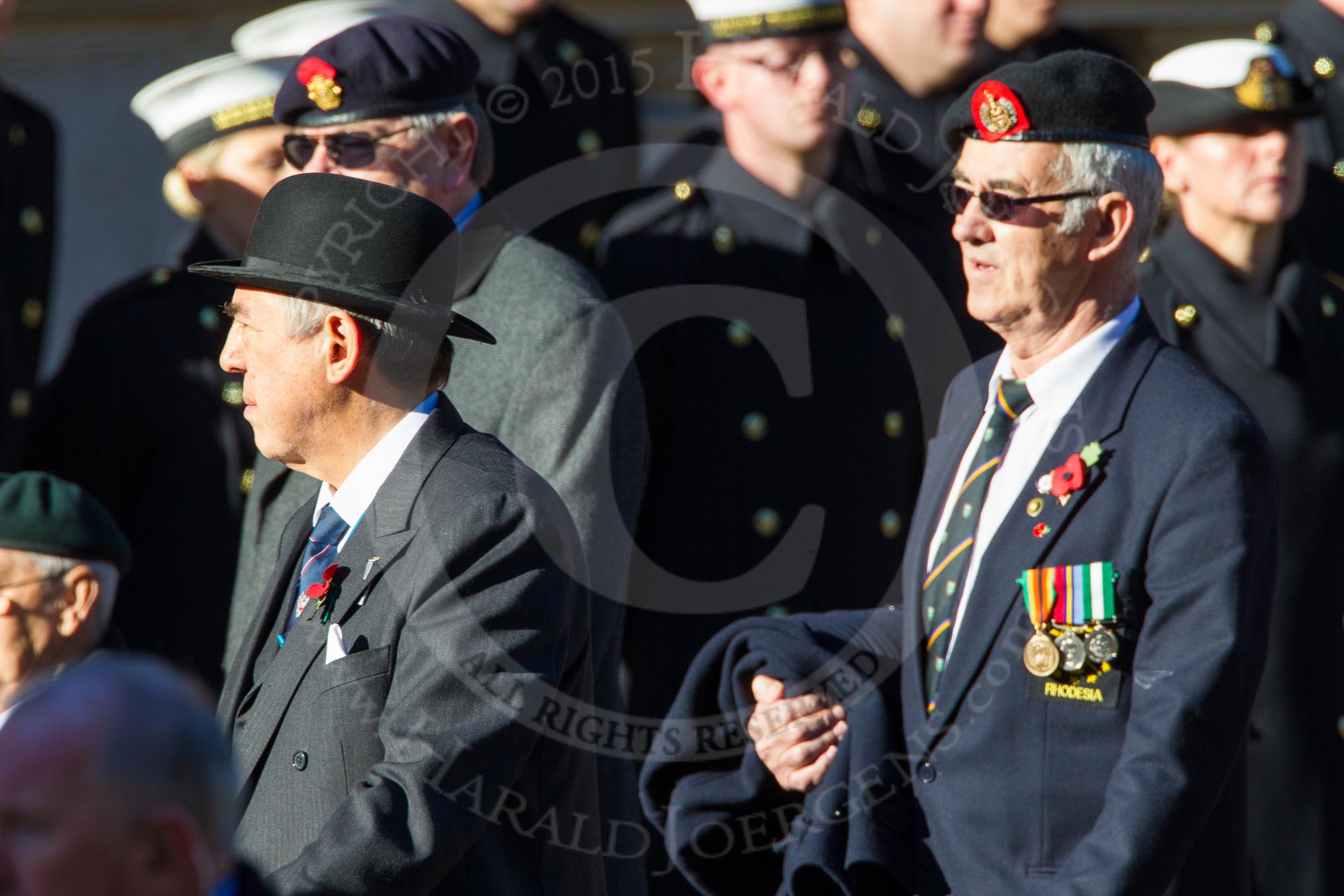 Remembrance Sunday Cenotaph March Past 2013: F12 - Far East Prisoners of War..
Press stand opposite the Foreign Office building, Whitehall, London SW1,
London,
Greater London,
United Kingdom,
on 10 November 2013 at 11:52, image #862
