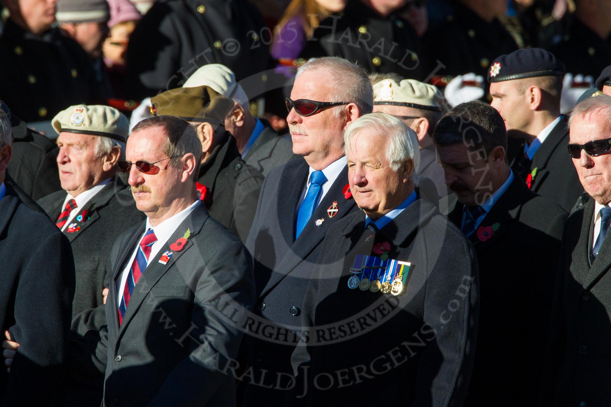 Remembrance Sunday Cenotaph March Past 2013: F22 - Black and White Club..
Press stand opposite the Foreign Office building, Whitehall, London SW1,
London,
Greater London,
United Kingdom,
on 10 November 2013 at 11:54, image #978