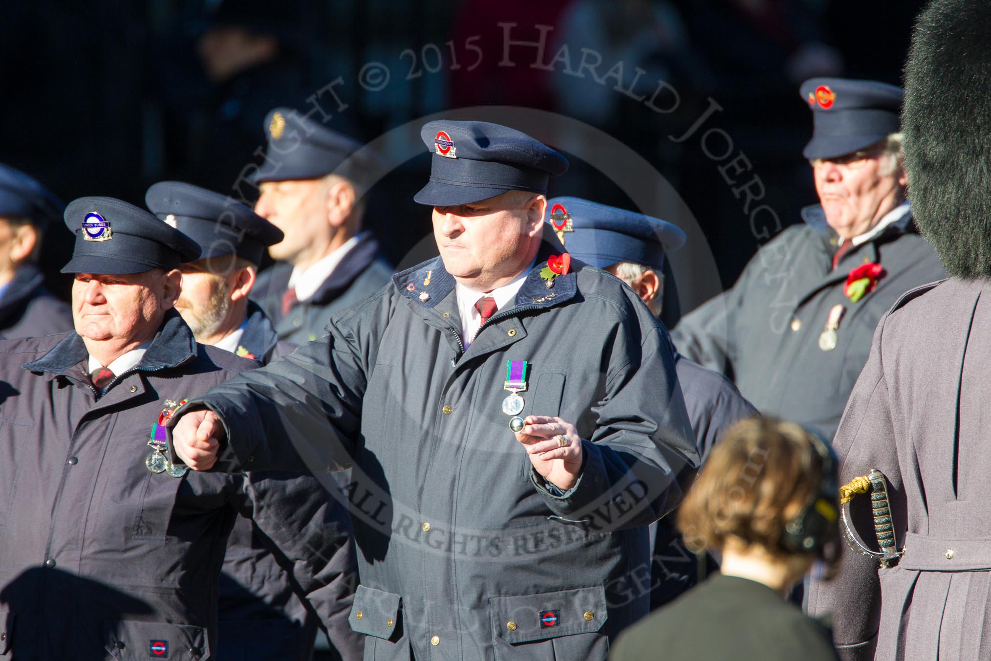 Remembrance Sunday Cenotaph March Past 2013: M1 - Transport For London..
Press stand opposite the Foreign Office building, Whitehall, London SW1,
London,
Greater London,
United Kingdom,
on 10 November 2013 at 12:09, image #1858