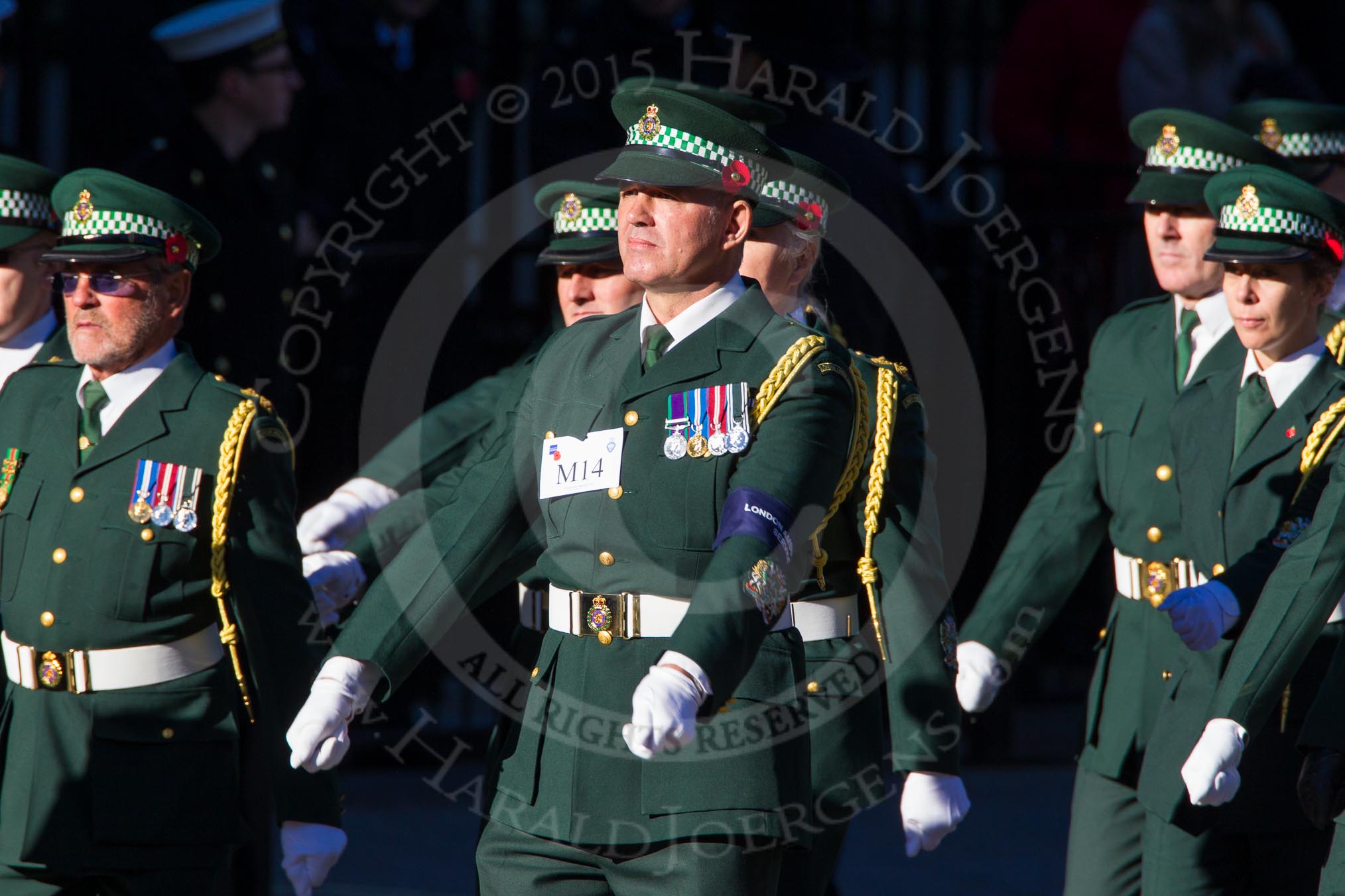 Remembrance Sunday Cenotaph March Past 2013: M14 - London Ambulance Service NHS Trust..
Press stand opposite the Foreign Office building, Whitehall, London SW1,
London,
Greater London,
United Kingdom,
on 10 November 2013 at 12:10, image #1979