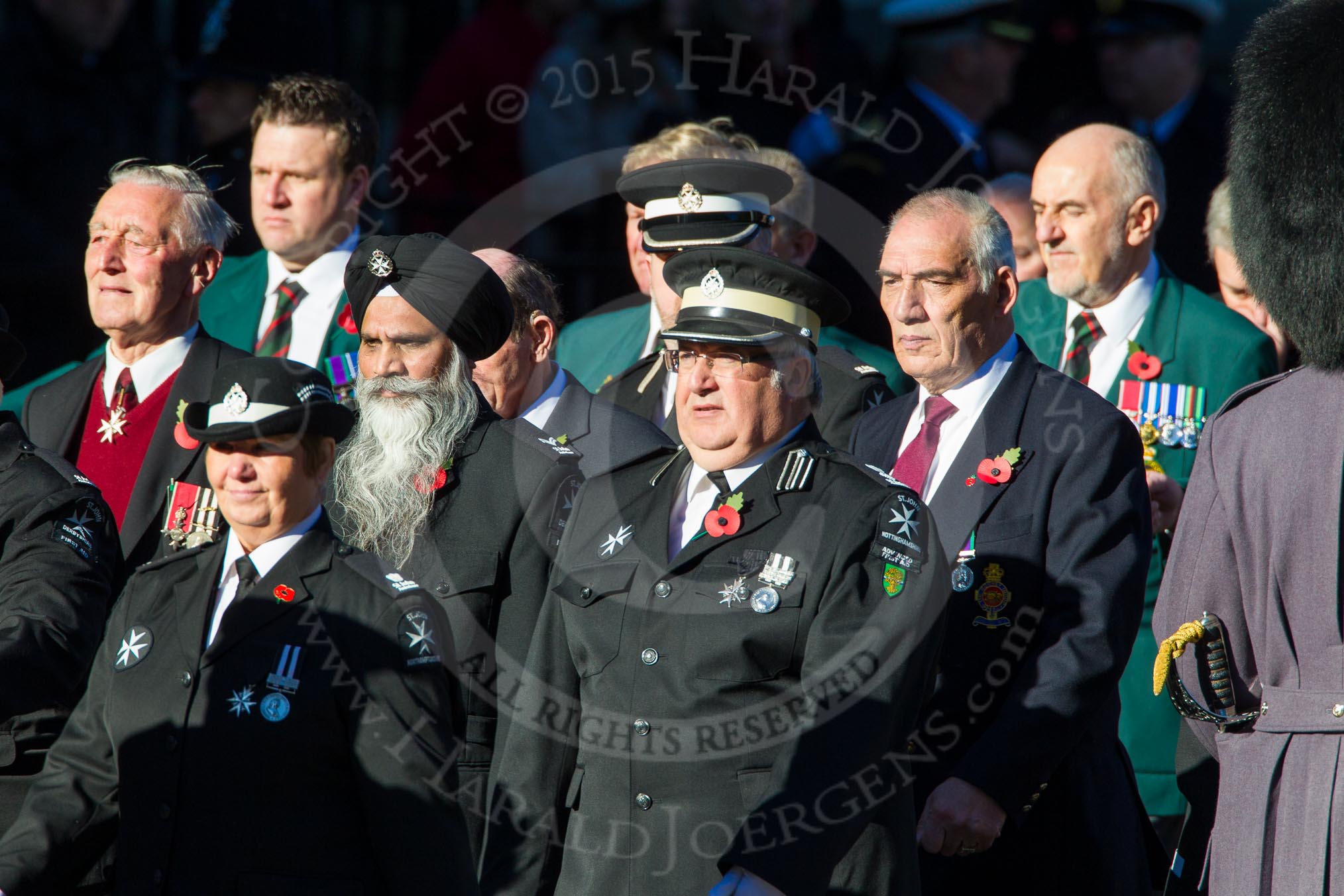 Remembrance Sunday Cenotaph March Past 2013: M16 - St John Ambulance..
Press stand opposite the Foreign Office building, Whitehall, London SW1,
London,
Greater London,
United Kingdom,
on 10 November 2013 at 12:11, image #2002