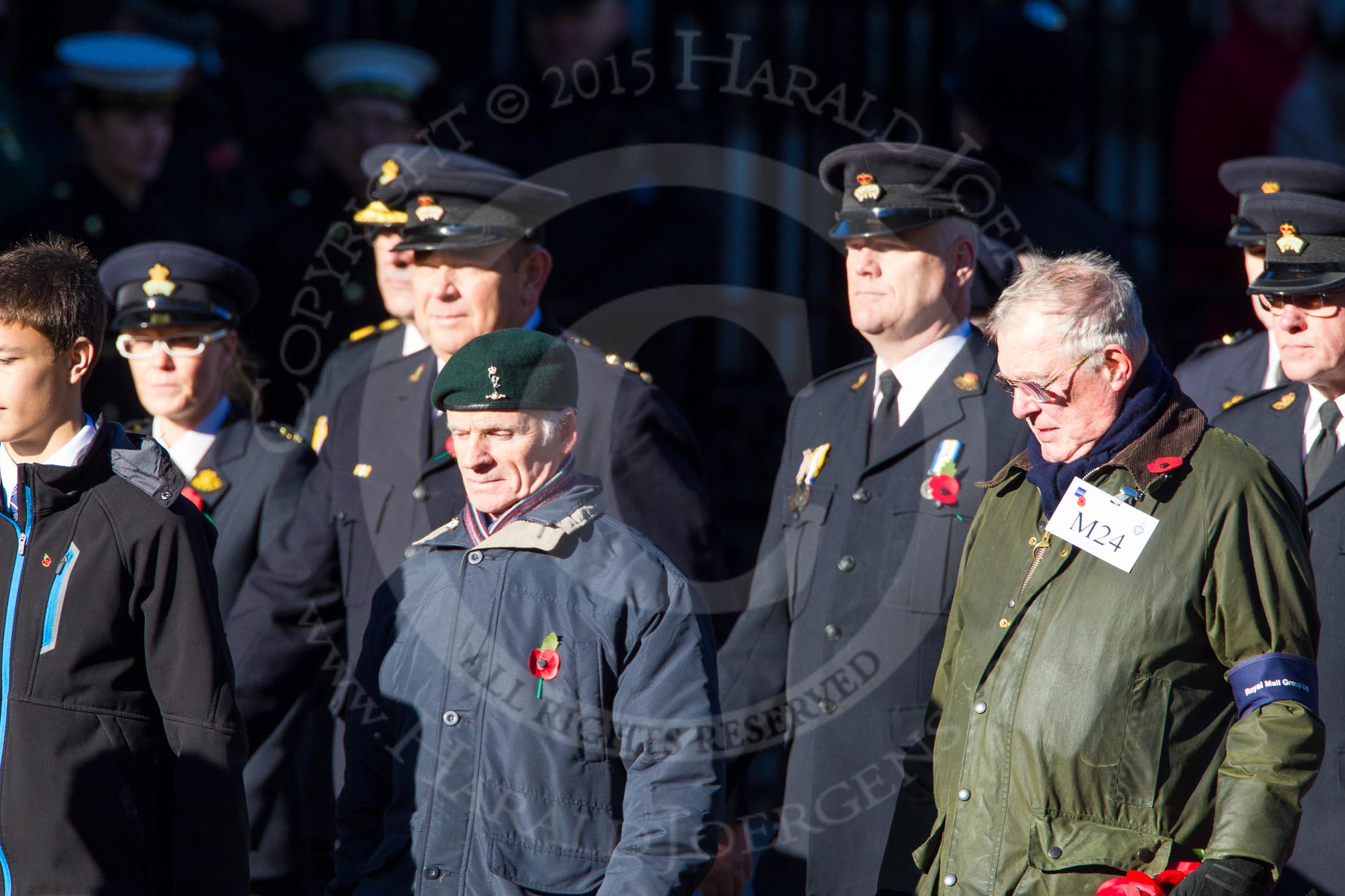 Remembrance Sunday Cenotaph March Past 2013: M24 - Royal Mail Group Ltd..
Press stand opposite the Foreign Office building, Whitehall, London SW1,
London,
Greater London,
United Kingdom,
on 10 November 2013 at 12:12, image #2069