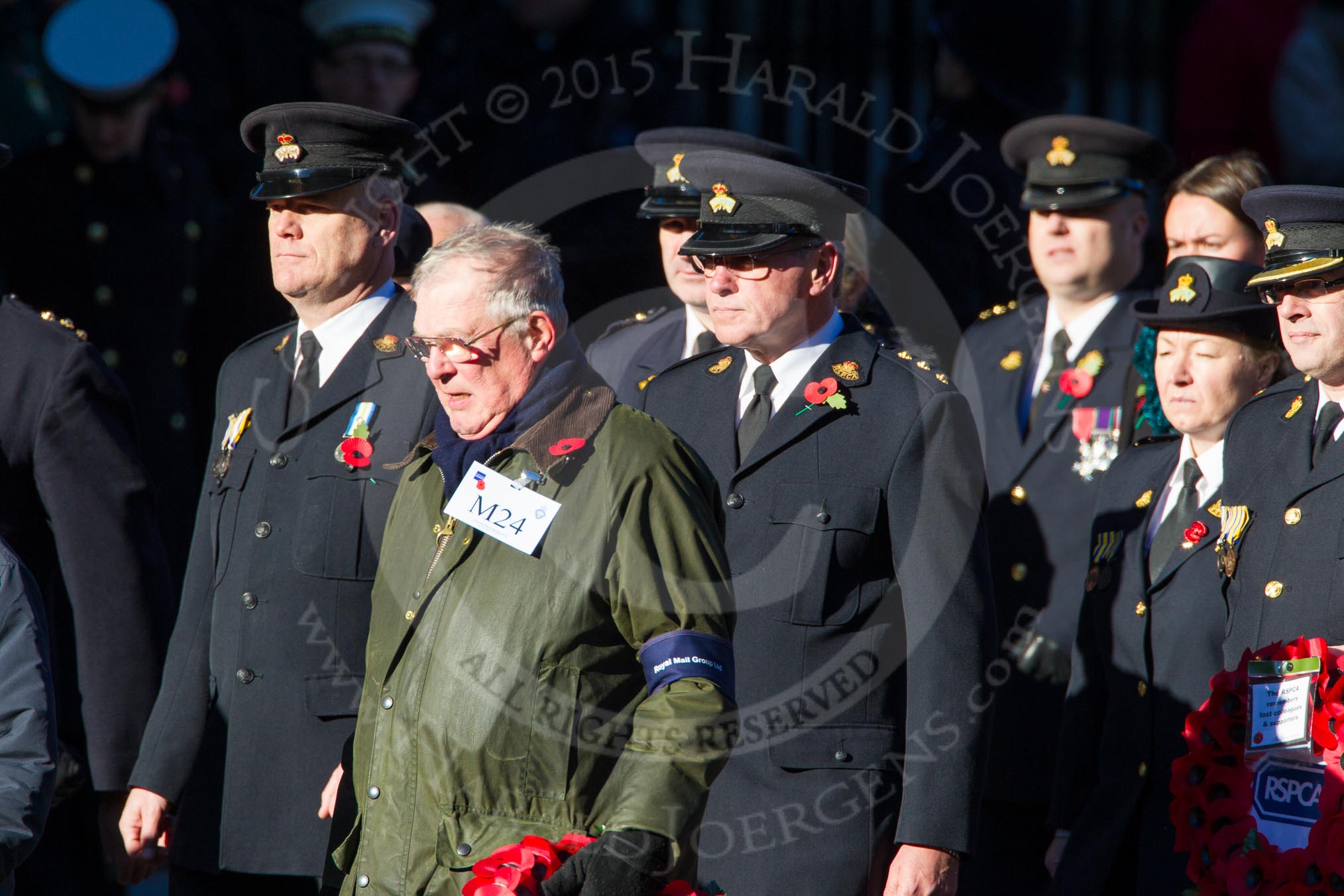 Remembrance Sunday Cenotaph March Past 2013: M24 - Royal Mail Group Ltd..
Press stand opposite the Foreign Office building, Whitehall, London SW1,
London,
Greater London,
United Kingdom,
on 10 November 2013 at 12:12, image #2070