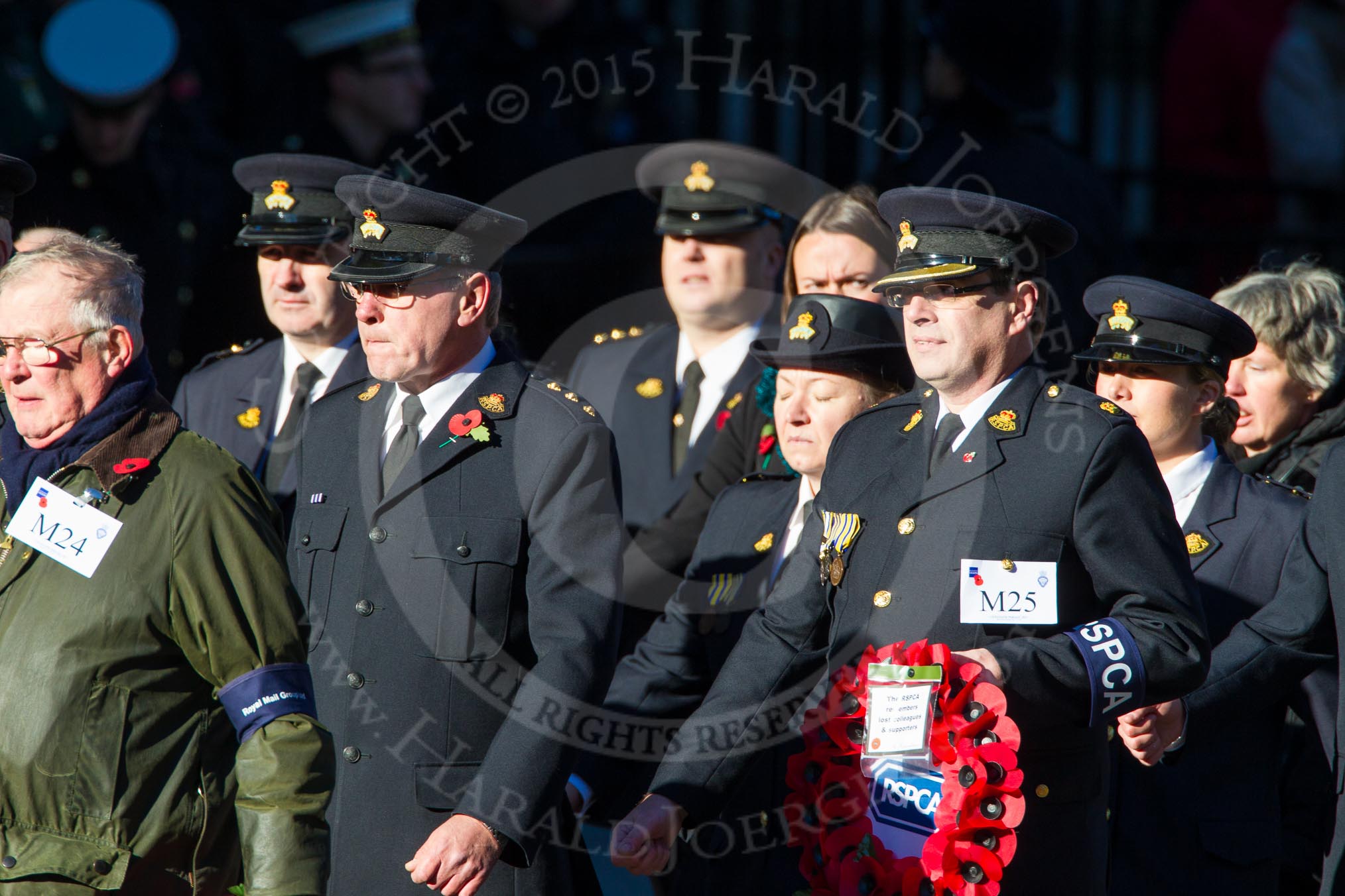 Remembrance Sunday Cenotaph March Past 2013: M24 - Royal Mail Group Ltd..
Press stand opposite the Foreign Office building, Whitehall, London SW1,
London,
Greater London,
United Kingdom,
on 10 November 2013 at 12:12, image #2071