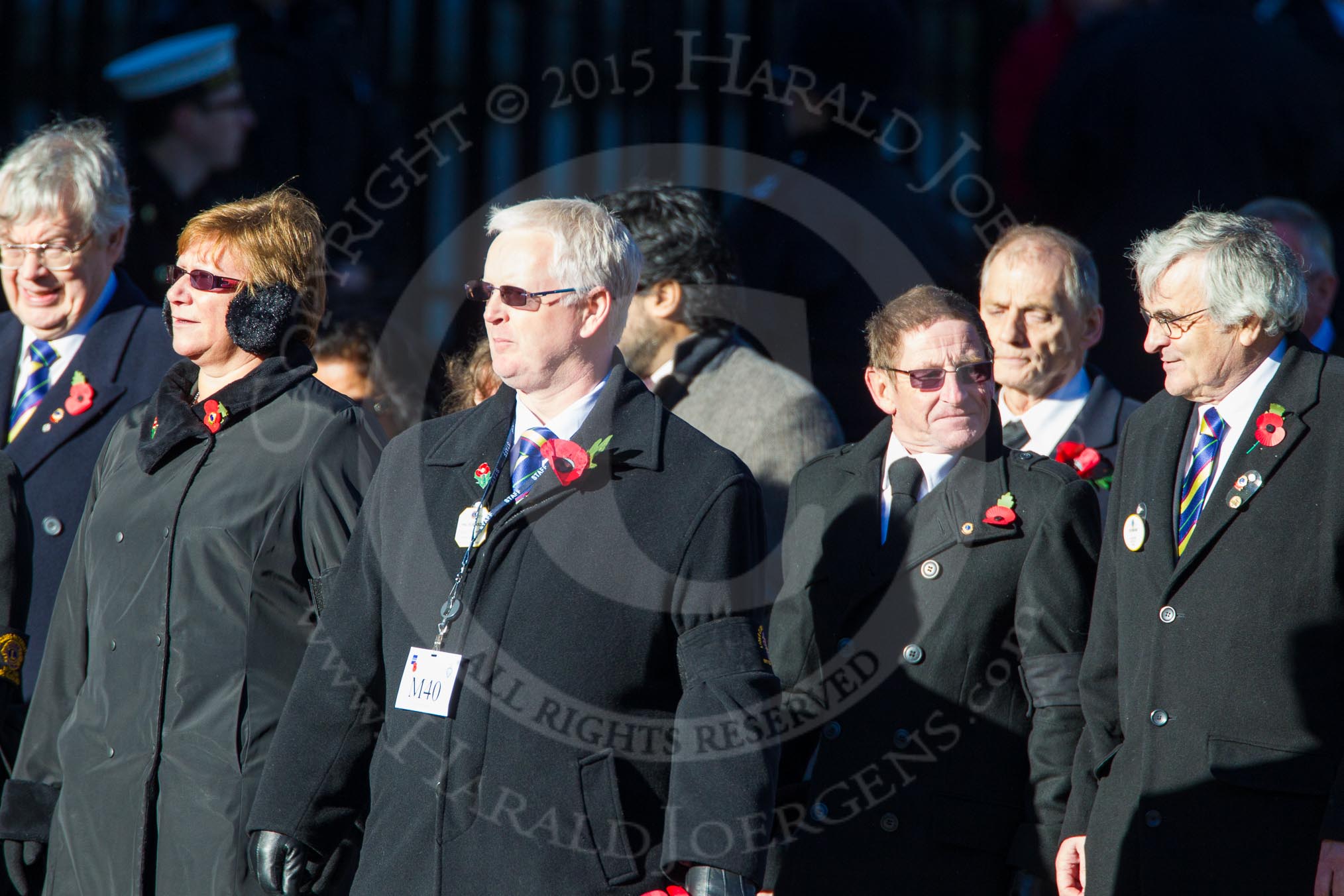 Remembrance Sunday Cenotaph March Past 2013: M40 - Lions Club International..
Press stand opposite the Foreign Office building, Whitehall, London SW1,
London,
Greater London,
United Kingdom,
on 10 November 2013 at 12:14, image #2184