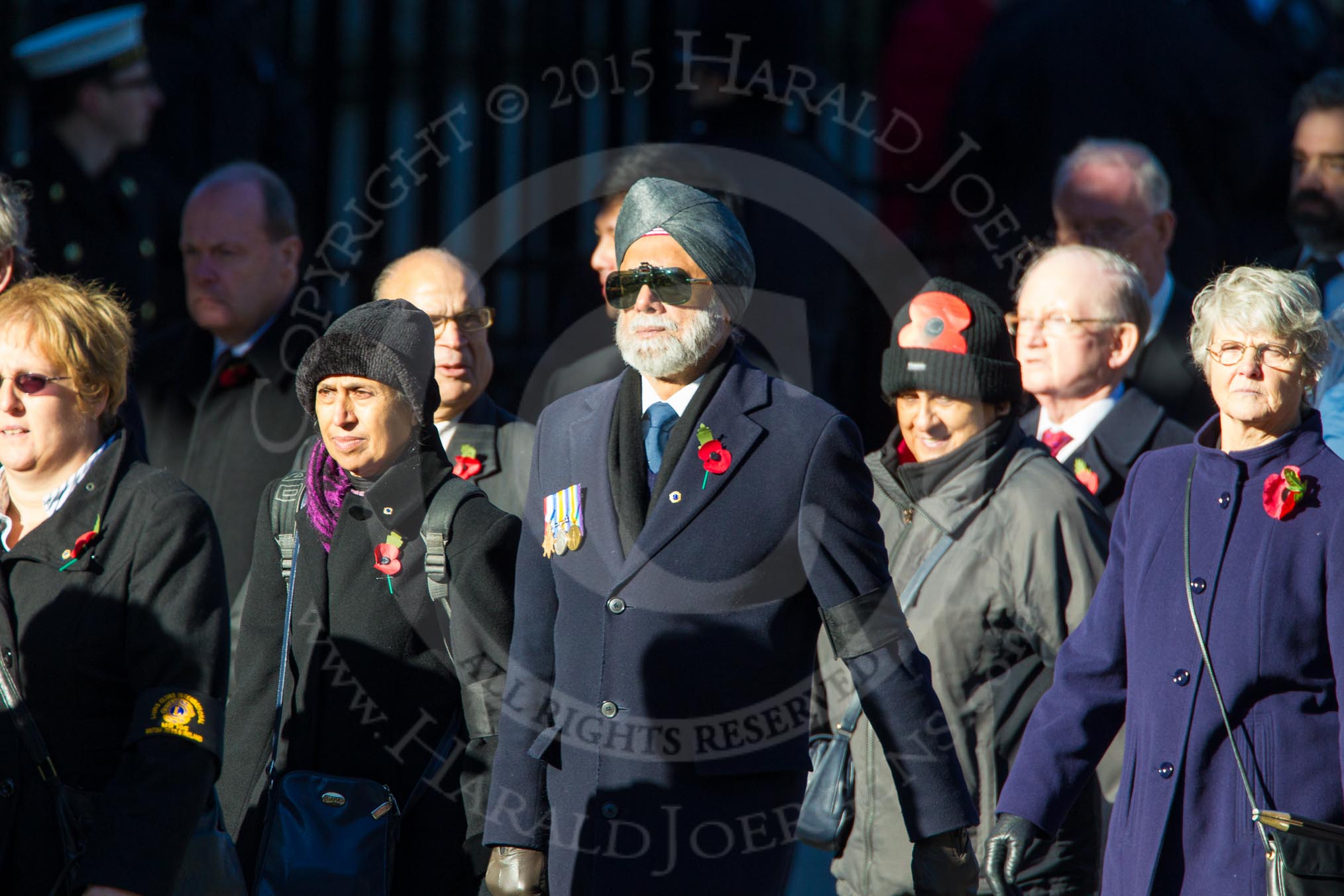 Remembrance Sunday Cenotaph March Past 2013: M40 - Lions Club International..
Press stand opposite the Foreign Office building, Whitehall, London SW1,
London,
Greater London,
United Kingdom,
on 10 November 2013 at 12:14, image #2190