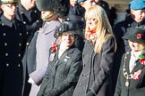 Remembrance Sunday Cenotaph March Past 2013: D1 - War Widows Association. The lady with the long blond hair is Lesley-Ann George-Taylor, Chairman of the Royal Navy and Royal Marines Widows Association. On the left, with the black hat, is the WWA Committee member Marjory Dodson..
Press stand opposite the Foreign Office building, Whitehall, London SW1,
London,
Greater London,
United Kingdom,
on 10 November 2013 at 11:38, image #17