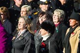 Remembrance Sunday Cenotaph March Past 2013: D1 - War Widows Association. The lady with with the long blod hair is WWA Committee member Susan Williams from Cornwall, next to her, with the black furry hat, is WWA Committee member Alberta McMenemy from Northern Ireland ..
Press stand opposite the Foreign Office building, Whitehall, London SW1,
London,
Greater London,
United Kingdom,
on 10 November 2013 at 11:38, image #27